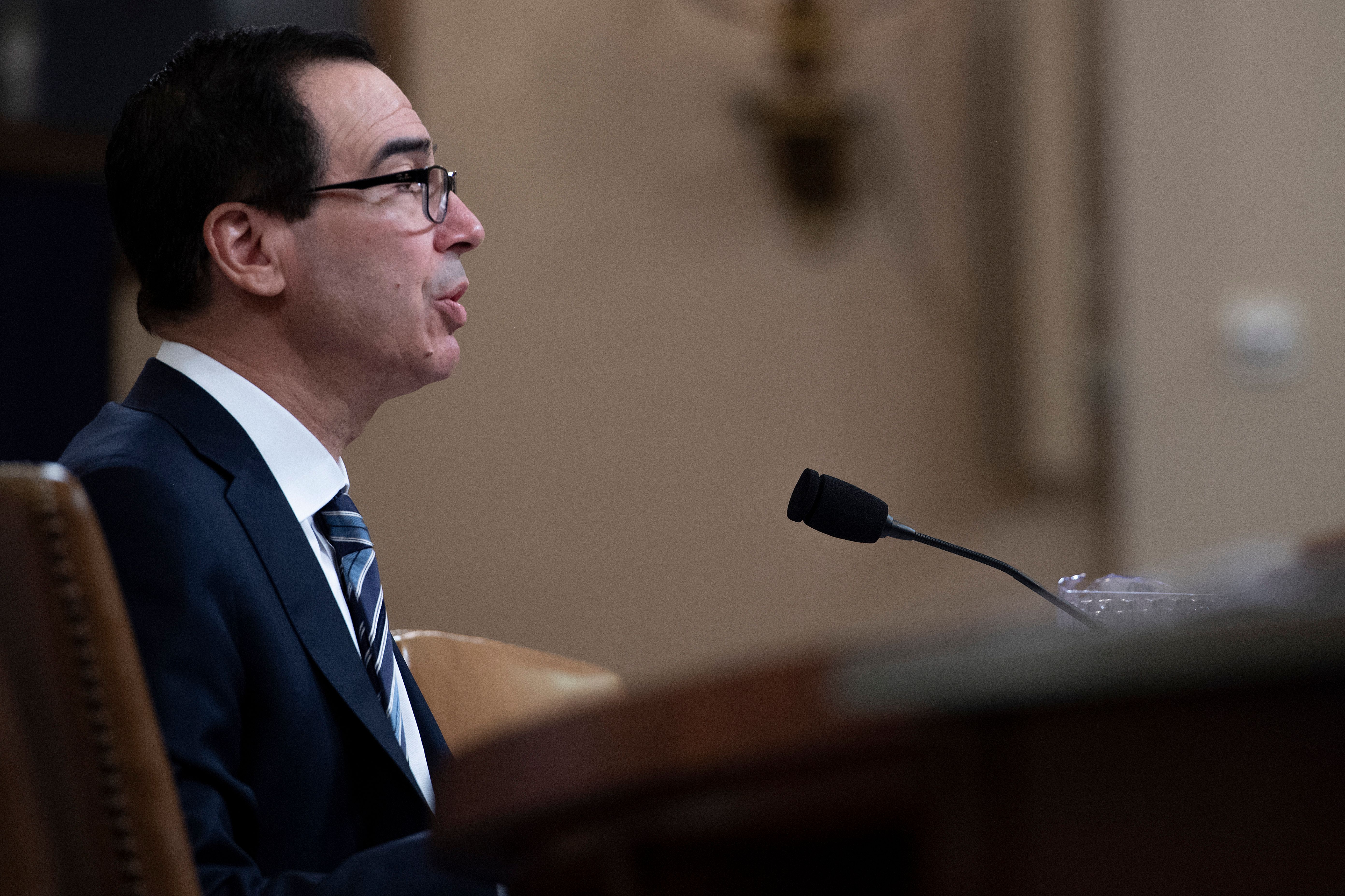 US Treasury Secretary Steven Mnuchin testifies on "The President's FY2020 Budget Proposal" before the House Ways and Means Committee on Capitol Hill in Washington, DC, on March 14, 2019. (Photo by Jim WATSON / AFP) (Photo credit should read JIM WATSON/AFP/Getty Images)