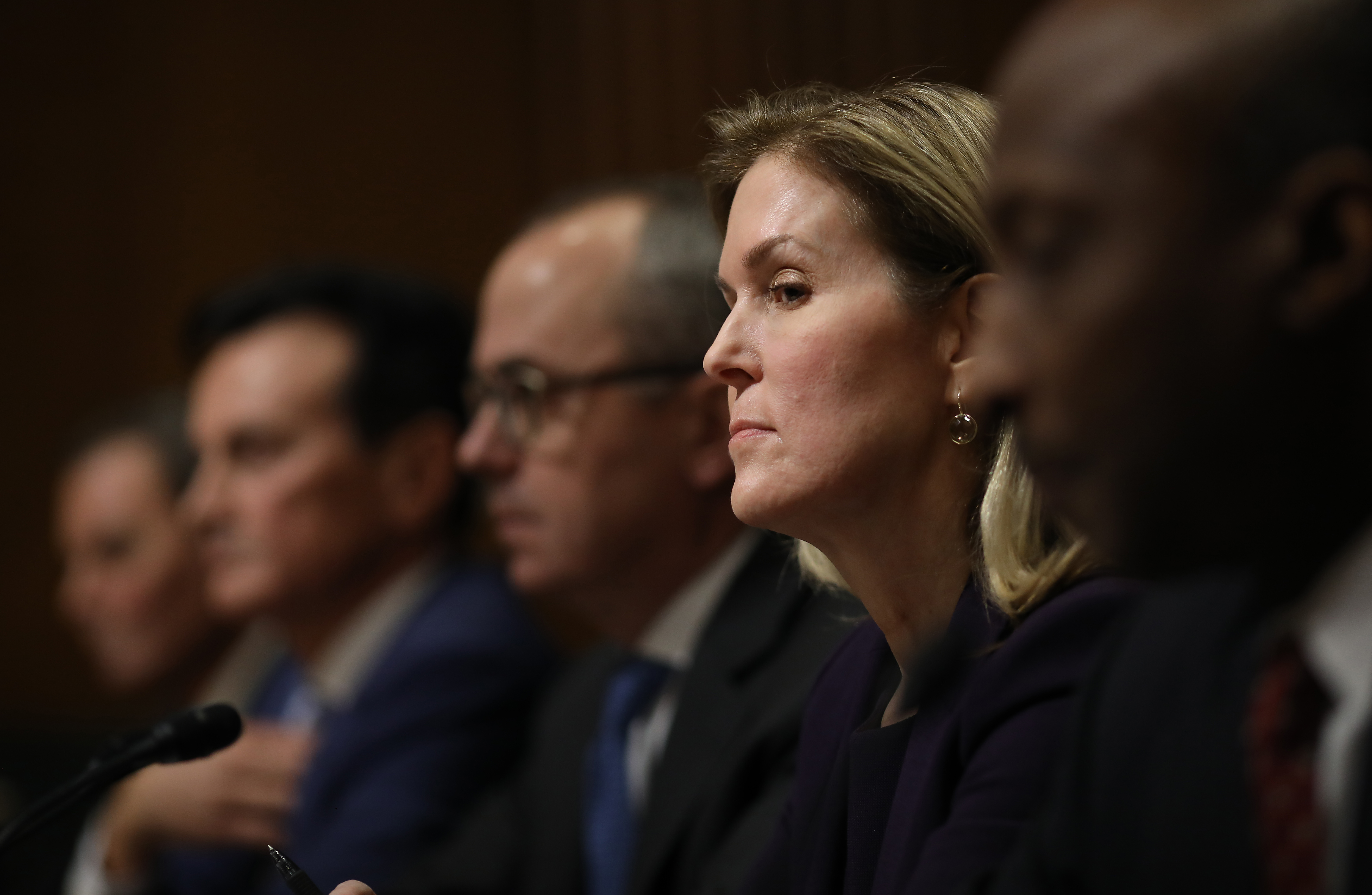 Jennifer Taubert, executive vice president and worldwide chairman of Janssen Pharmaceuticals, Johnson & Johnson (2nd R) testifies before the Senate Finance Committee on "Drug Pricing in America: A Prescription for Change, Part II" February 26, 2019 in Washington, DC. (Photo by Win McNamee/Getty Images)