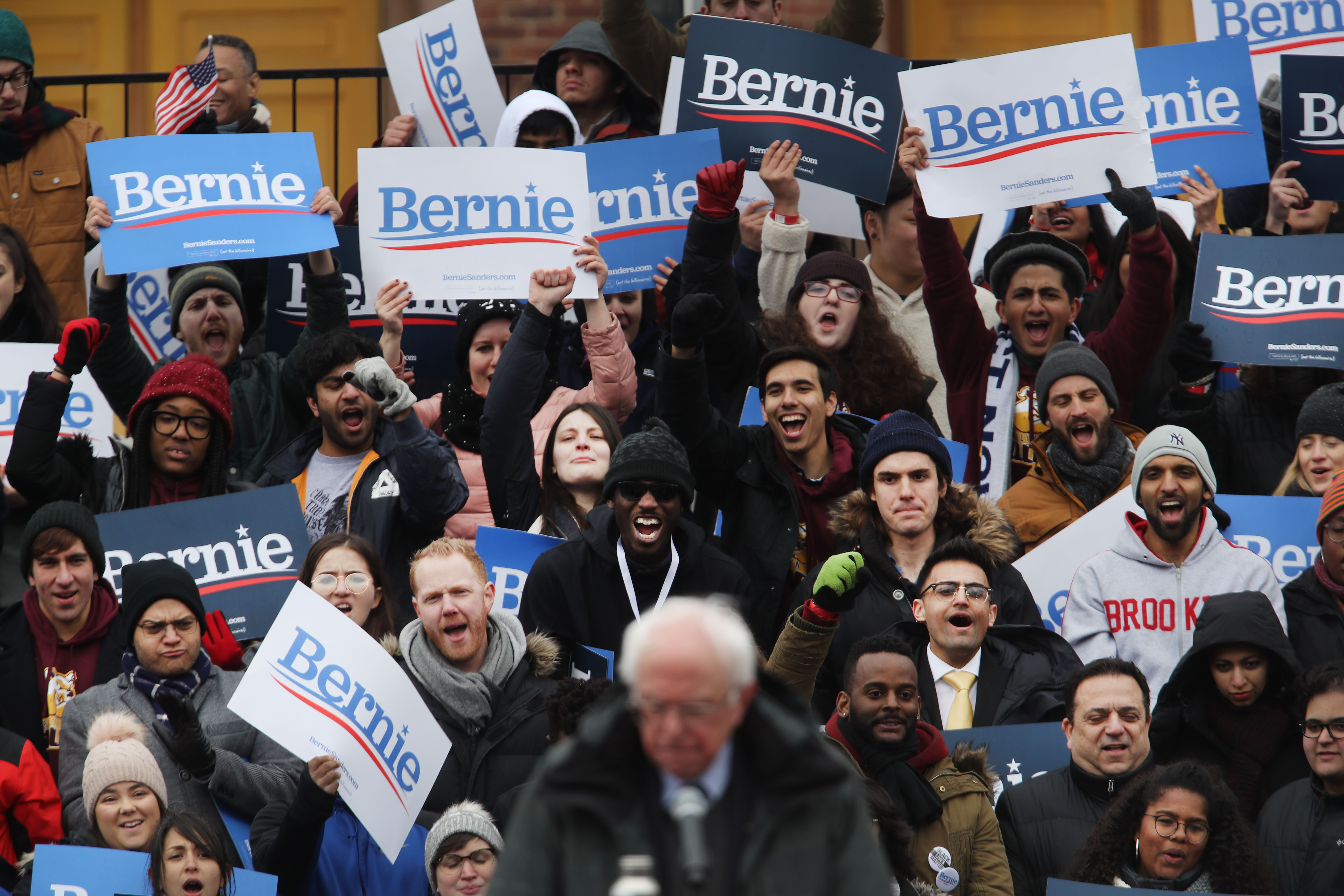 People listen to Democratic Presidential candidate U.S. Sen. Bernie Sanders speaks to supporters at Brooklyn College on March 02, 2019 in the Brooklyn borough of New York City. (Photo by Spencer Platt/Getty Images)