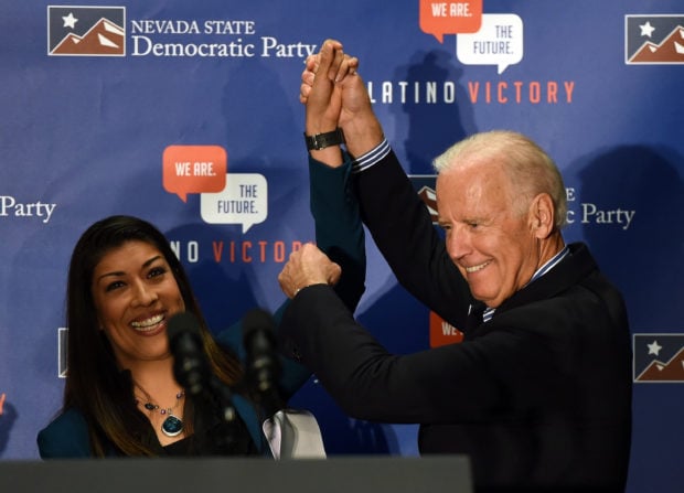 LAS VEGAS, NV - NOVEMBER 01: Democratic candidate for lieutenant governor and current Nevada Assemblywoman Lucy Flores (D-Las Vegas) (L) introduces U.S. Vice President Joe Biden at a get-out-the-vote rally at a union hall on November 1, 2014 in Las Vegas, Nevada. Biden is stumping for Nevada Democrats ahead of the November 4th election. (Photo by Ethan Miller/Getty Images)
