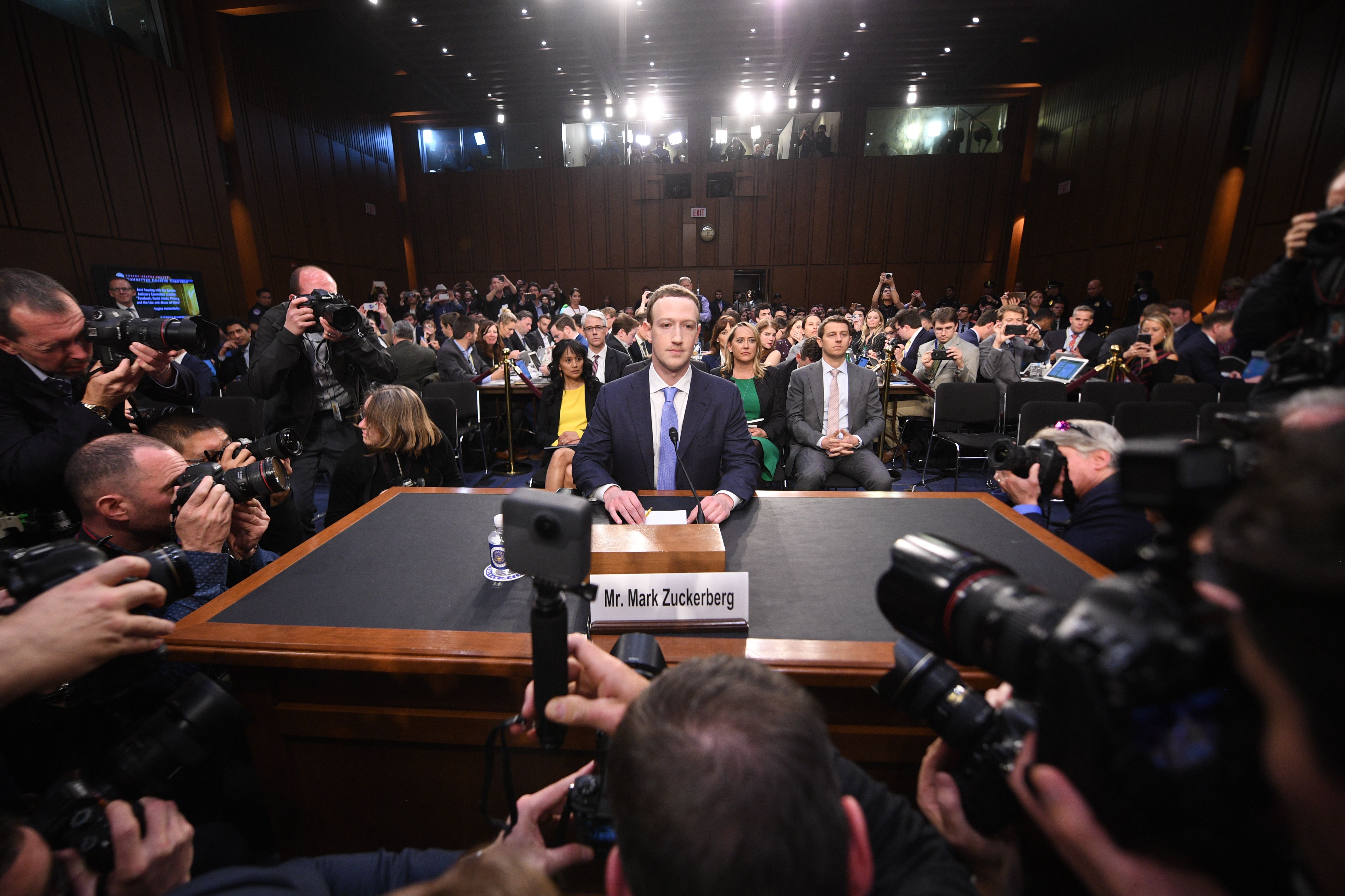 Facebook CEO Mark Zuckerberg arrives to testify before a joint hearing of the US Senate Commerce, Science and Transportation Committee and Senate Judiciary Committee on Capitol Hill, April 10, 2018 in Washington, DC. 