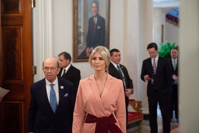 Senior White House advisor Ivanka Trump and Commerce Secretary Wilbur Ross (R) arrive for the first meeting of the American Workforce Policy Advisory Board with US President Donald Trump in the State Dining Room of the White House in Washington, DC, March 6, 2019. (Photo credit: SAUL LOEB/AFP/Getty Images)