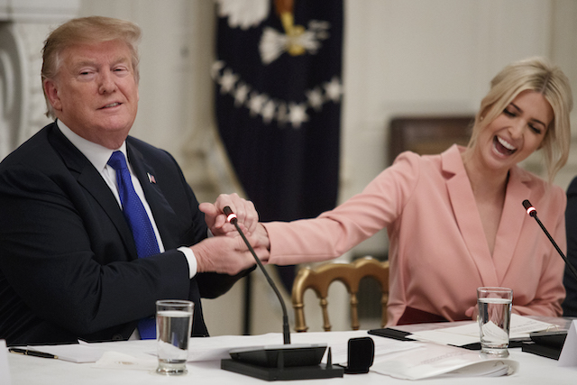 President Donald Trump shakes the had of his daughter and advisor, Ivanka Trump during a meeting with the American Workforce Policy Advisory Board inside the State Dining Room of the White House on March 6, 2019 in Washington, DC. The board, co-chaired by Ivanka and Commerce Secretary Wilbur Ross, is tasked with developing a strategy to revamp the U.S. workforce for well-paid, in-demand jobs and with promoting private-sector investments in workers. (Photo by Tom Brenner/Getty Images)