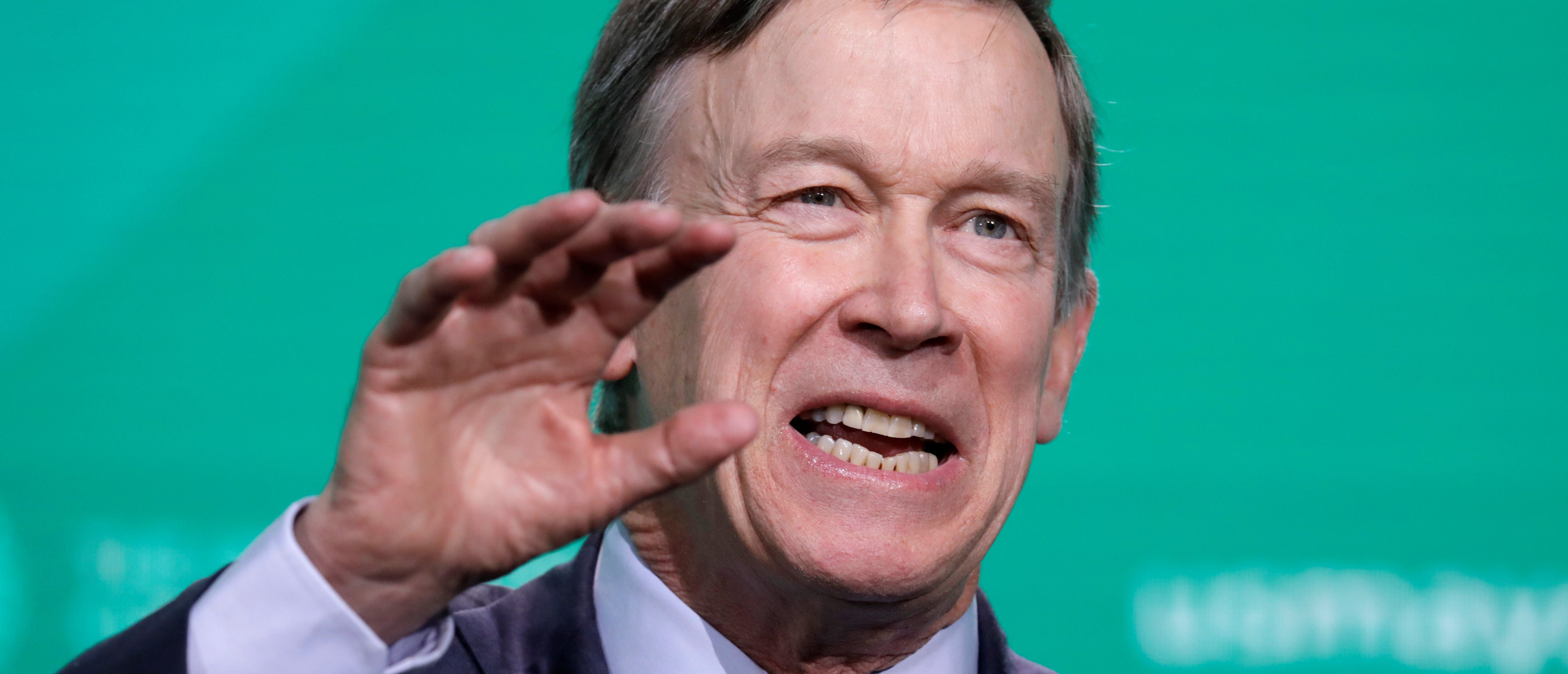 Former Gov. John Hickenlooper (D-CO) speaks at the United States Conference of Mayors winter meeting in Washington, U.S., January 24, 2019. REUTERS/Yuri Gripas.