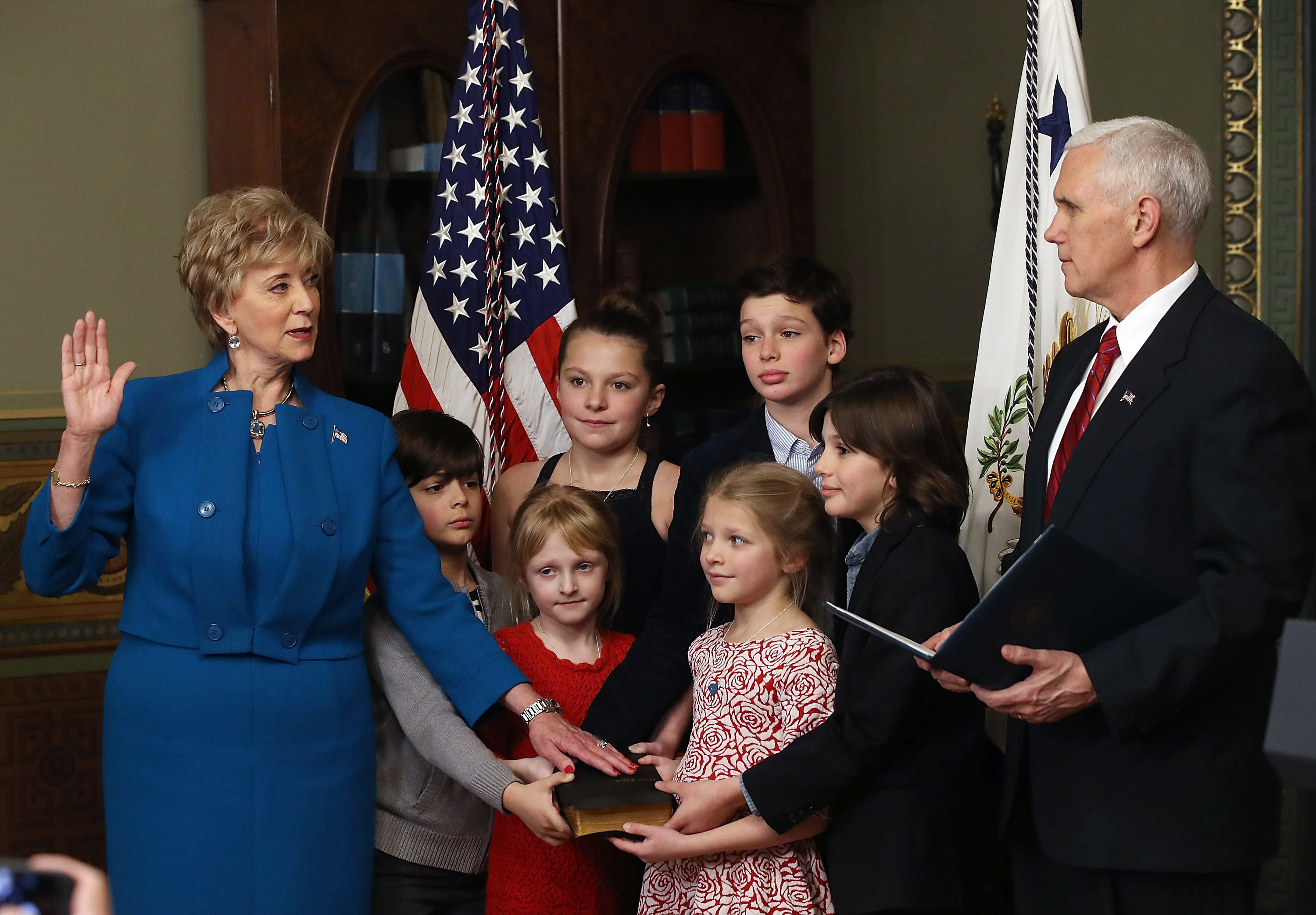 Former wrestling entertainment executive Linda McMahon is surrounded by her grandchildren as VP Mike Pence swears her in as head of the Small Business Administration. (Mark Wilson/Getty Images)