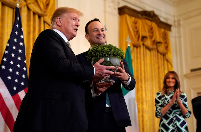 U.S. President Donald Trump and first lady Melania Trump take part in the Shamrock Bowl presentation from Irish Taoiseach Leo Varadkar at the White House in Washington, U.S., March 14, 2019. REUTERS/Kevin Lamarque
