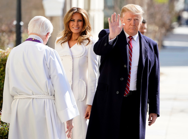 U.S. President Donald Trump and U.S. first lady Melania Trump are greeted by Interim Rector Reverend Bruce McPherson as they arrive at St. John's Episcopal Church in Washington, U.S., March 17, 2019. REUTERS/Joshua Roberts