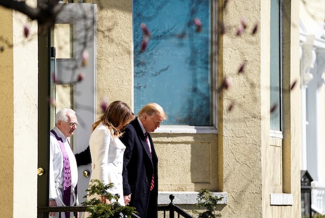 U.S. President Donald Trump and U.S. first lady Melania Trump walk with Interim Rector Reverend Bruce McPherson as they depart from St. John's Episcopal Church in Washington, U.S., March 17, 2019. REUTERS/Joshua Roberts