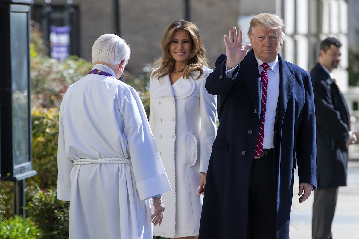 U.S. President Donald J. Trump (R) and first lady Melania Trump (C) are greeted by Reverend W. Bruce McPherson (L) as they arrive to attend services at St. John's Episcopal Church March 17, 2019 in Washington, DC, USA. The Trumps are attending church on St. Patrick's Day. (Photo by Eric Lesser - Pool/Getty Images)