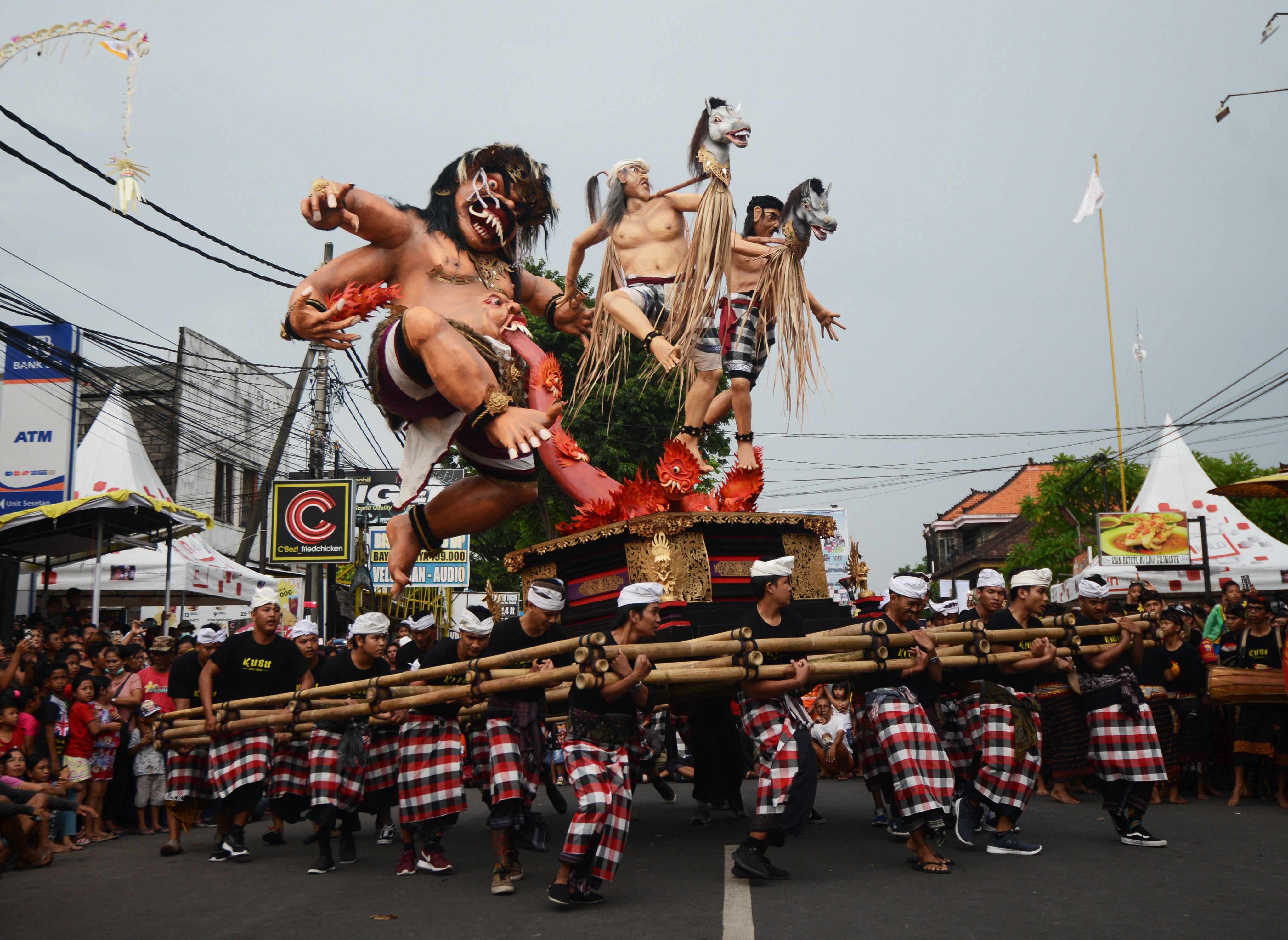 Balinese people carry an Ogoh-Ogoh effigy during a parade ahead of the "Day of Silence" in Denpasar on Indonesia's resort island of Bali on March 6, 2019. (SONNY TUMBELAKA/AFP/Getty Images)
