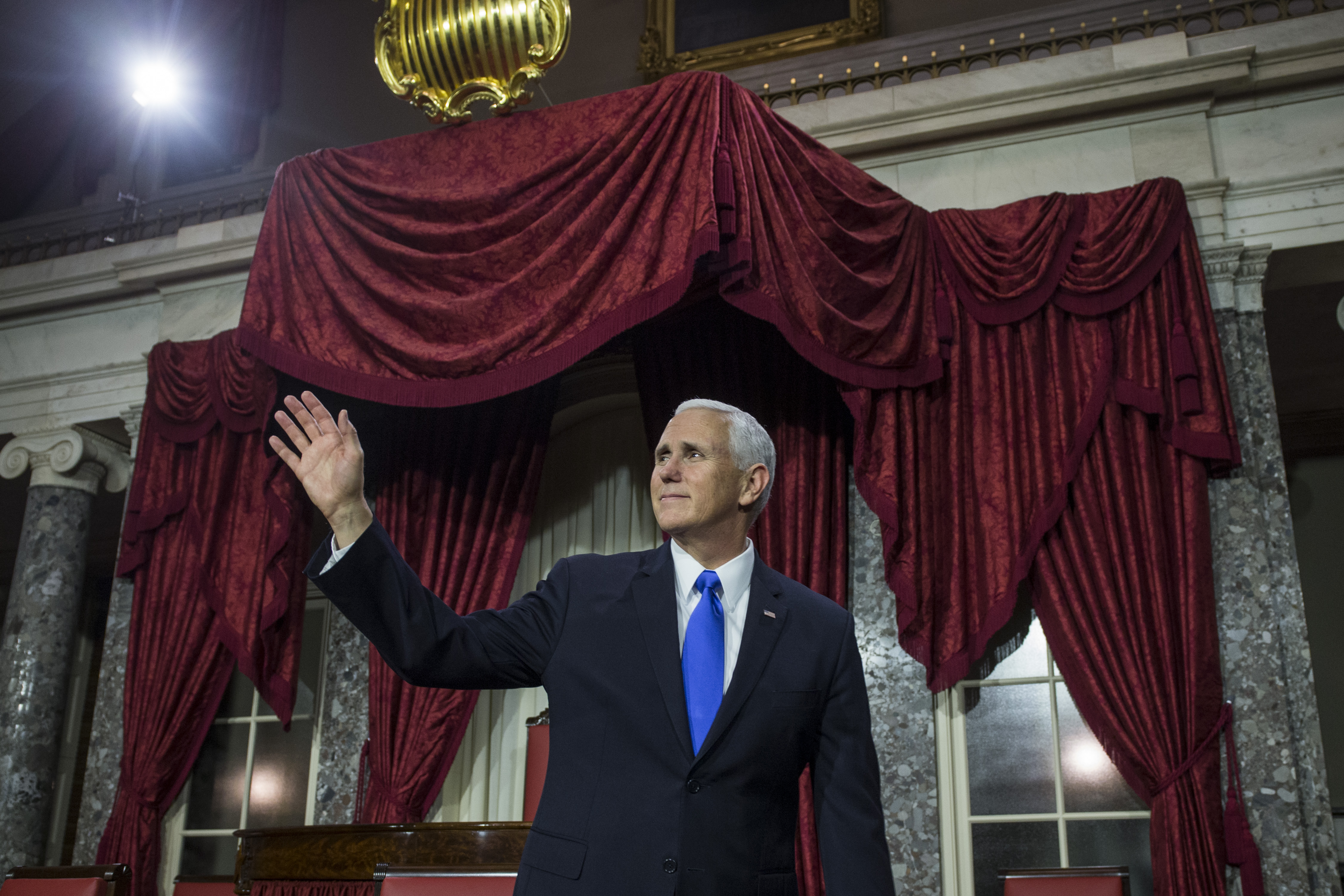 Vice President Mike Pence waves after a mock swearing in ceremony for members of the U.S. Senate on Capitol Hill on January 3, 2019 in Washington, DC. (Photo by Zach Gibson/Getty Images)