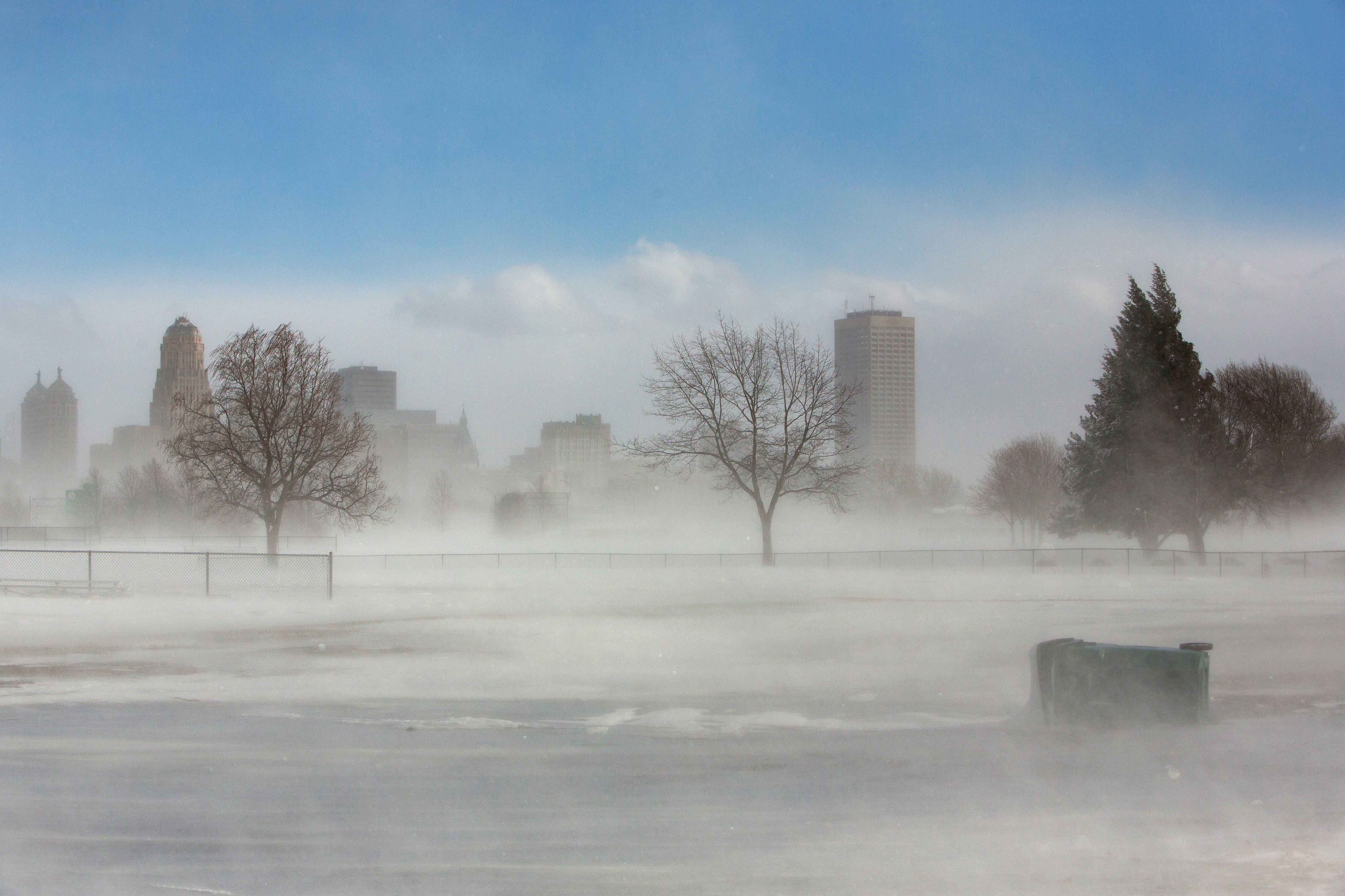 The city skyline is seen in drifting snow during the polar vortex in Buffalo