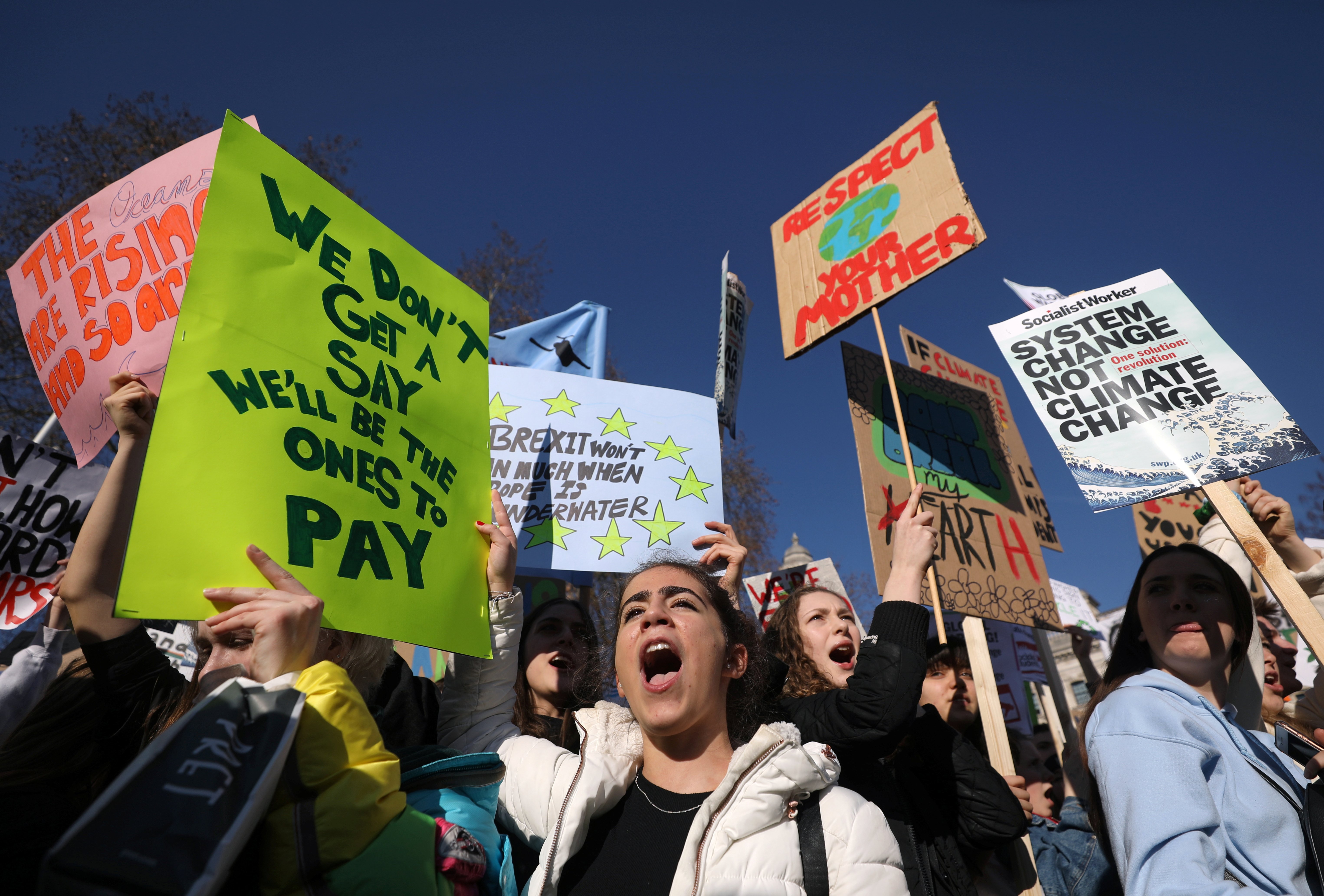 People take part in a "youth strike for climate change" demonstration in London