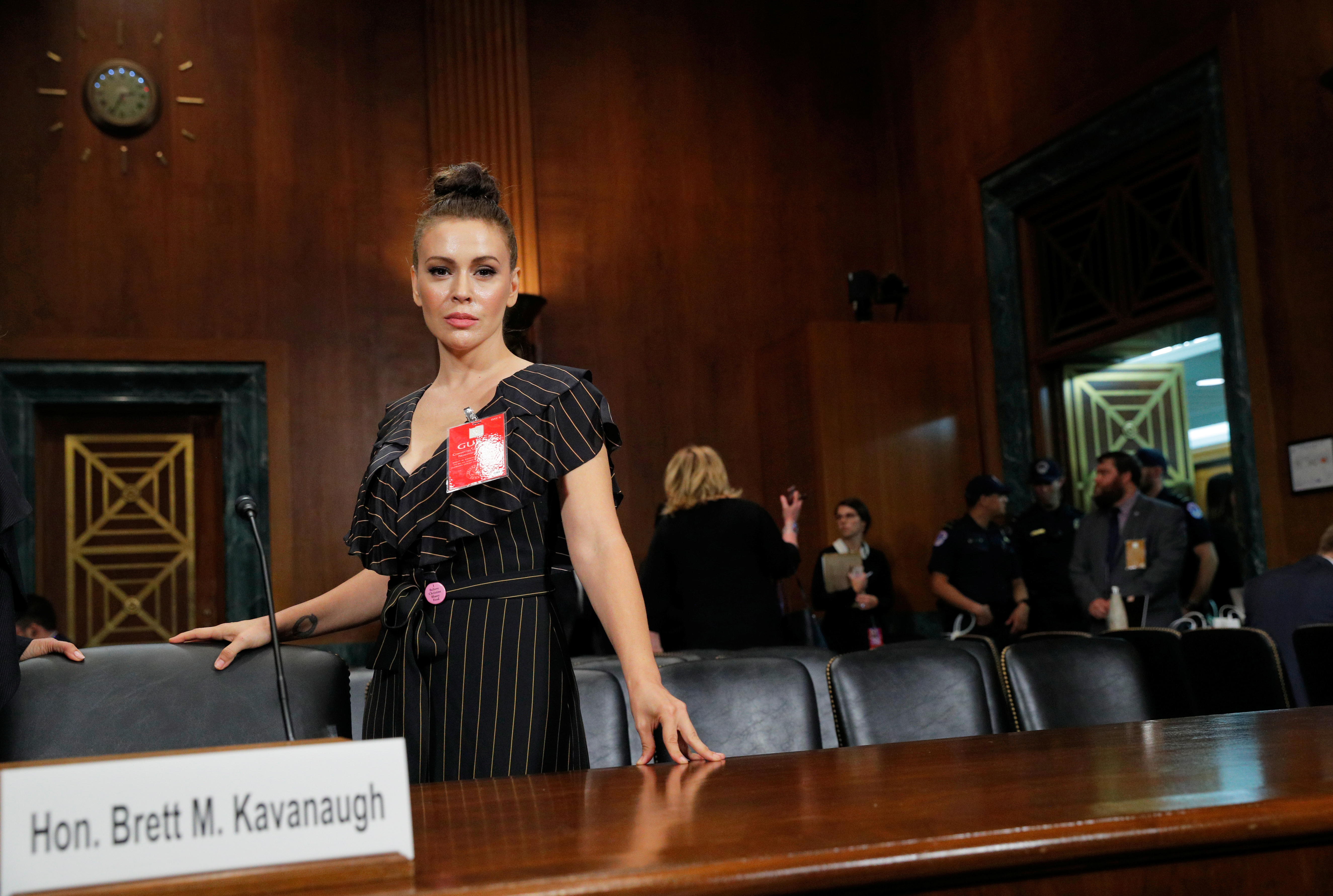 Actor Alyssa Milano stands in the hearing room after the conclusion of testimony before a Senate Judiciary Committee confirmation hearing for Kavanaugh by Professor Christine Blasey Ford, who has accused U.S. Supreme Court nominee Brett Kavanaugh of a sexual assault in 1982, on Capitol Hill in Washington, U.S., September 27, 2018. REUTERS/Jim Bourg 
