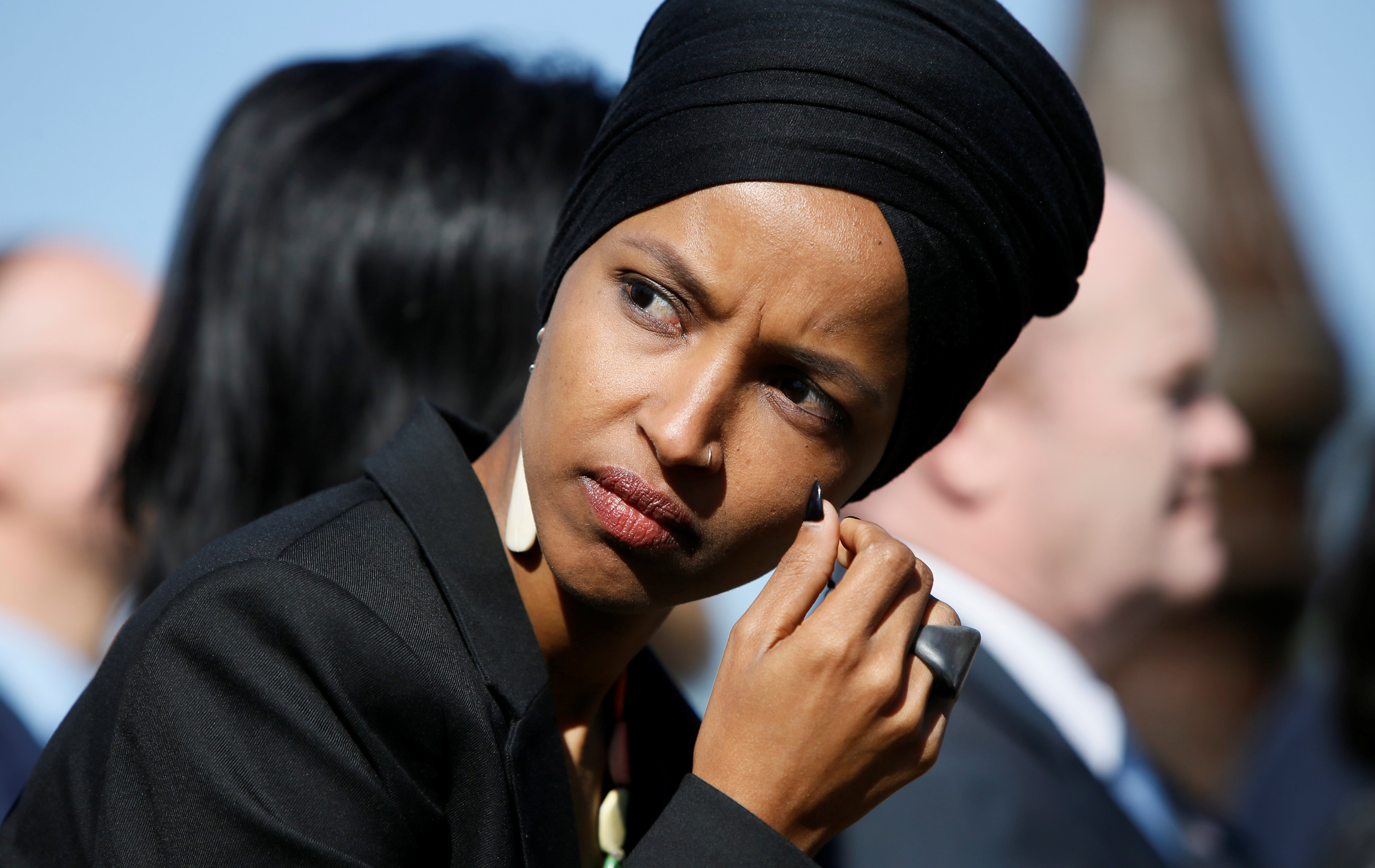 Rep. Ilhan Omar (D-MN) participates in a news conference by members of the U.S. Congress "to announce legislation to repeal President Trump’s existing executive order blocking travel from majority Muslim countries" outside the U.S. Capitol in Washington, U.S., April 10, 2019. REUTERS/Jim Bourg 