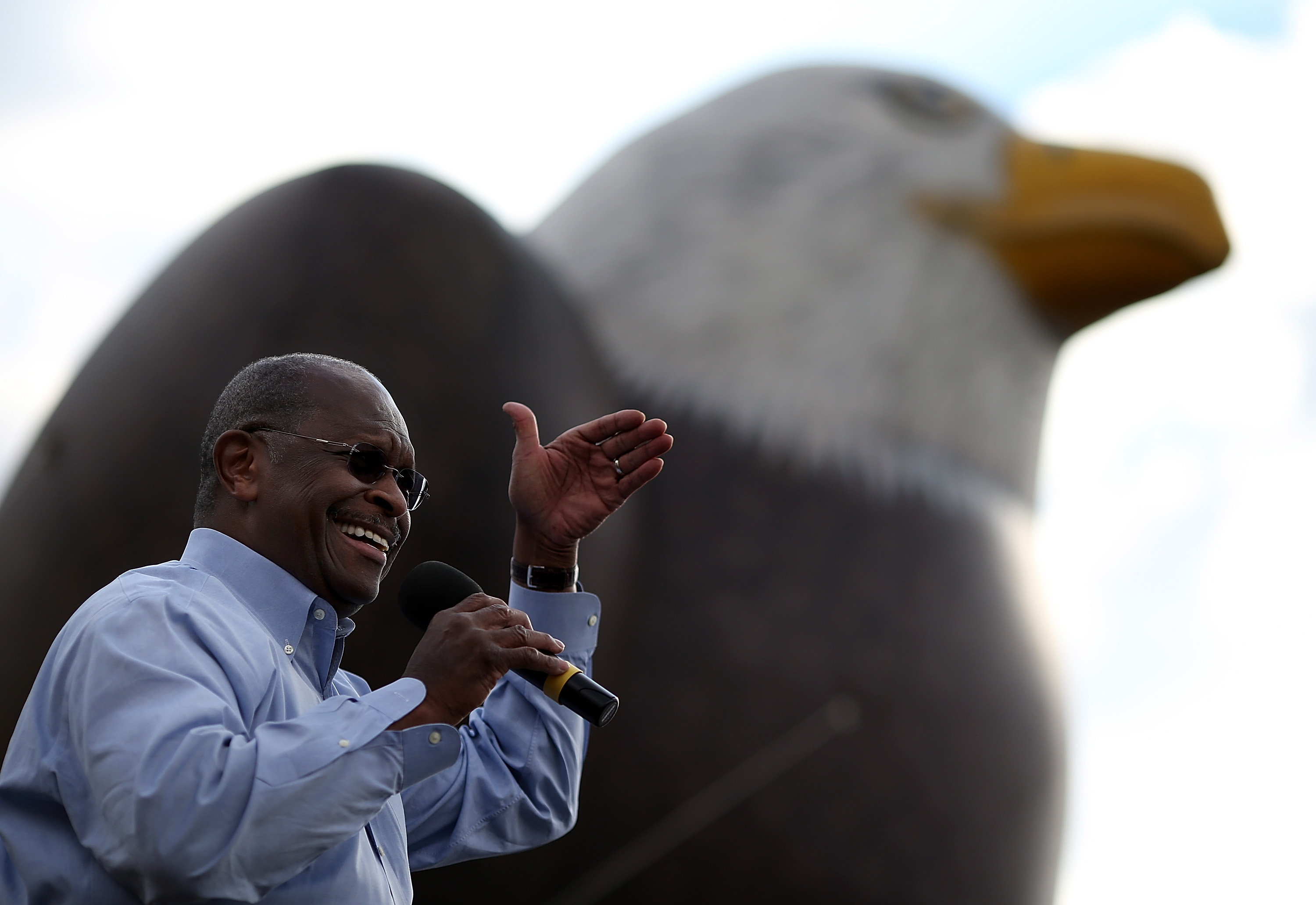 Former Republican presidential candidate Herman Cain speaks during an American For Prosperity rally on July 23, 2012 in Reno, Nevada. (Photo by Justin Sullivan/Getty Images)