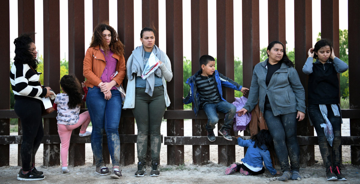 Central American migrants turn themselves in to U.S. Border Patrol as they seek asylum after illegally crossing the Rio Grande near Penitas, Texas, U.S., April 6, 2019. Picture taken April 6, 2019. REUTERS/Loren Elliott