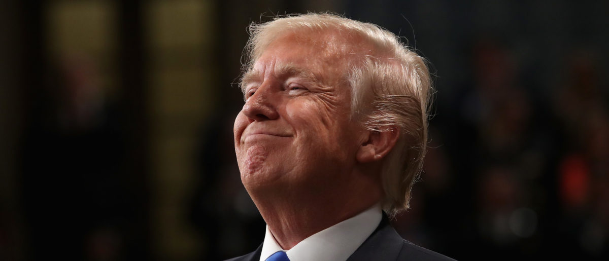 U.S. President Donald J. Trump smiles during the State of the Union address in the chamber of the U.S. House of Representatives January 30, 2018 in Washington, DC. This is the first State of the Union address given by U.S. President Donald Trump and his second joint-session address to Congress. (Photo by Win McNamee/Getty Images)