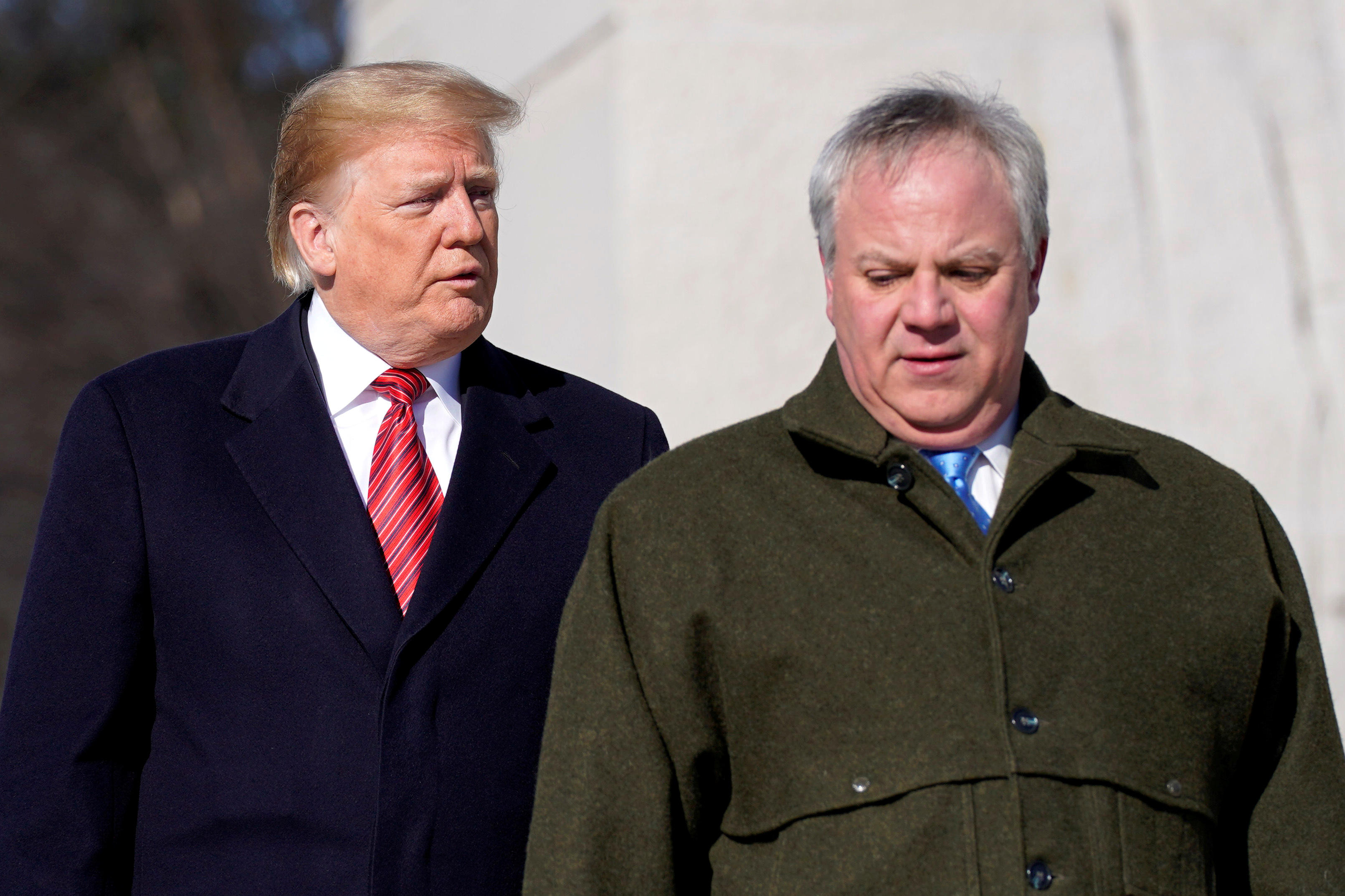 U.S. President Donald Trump and acting U.S. Secretary of Interior David Bernhardt arrive to place a wreath at the Martin Luther King Memorial in Washington, U.S., January 21, 2019. REUTERS/Joshua Roberts