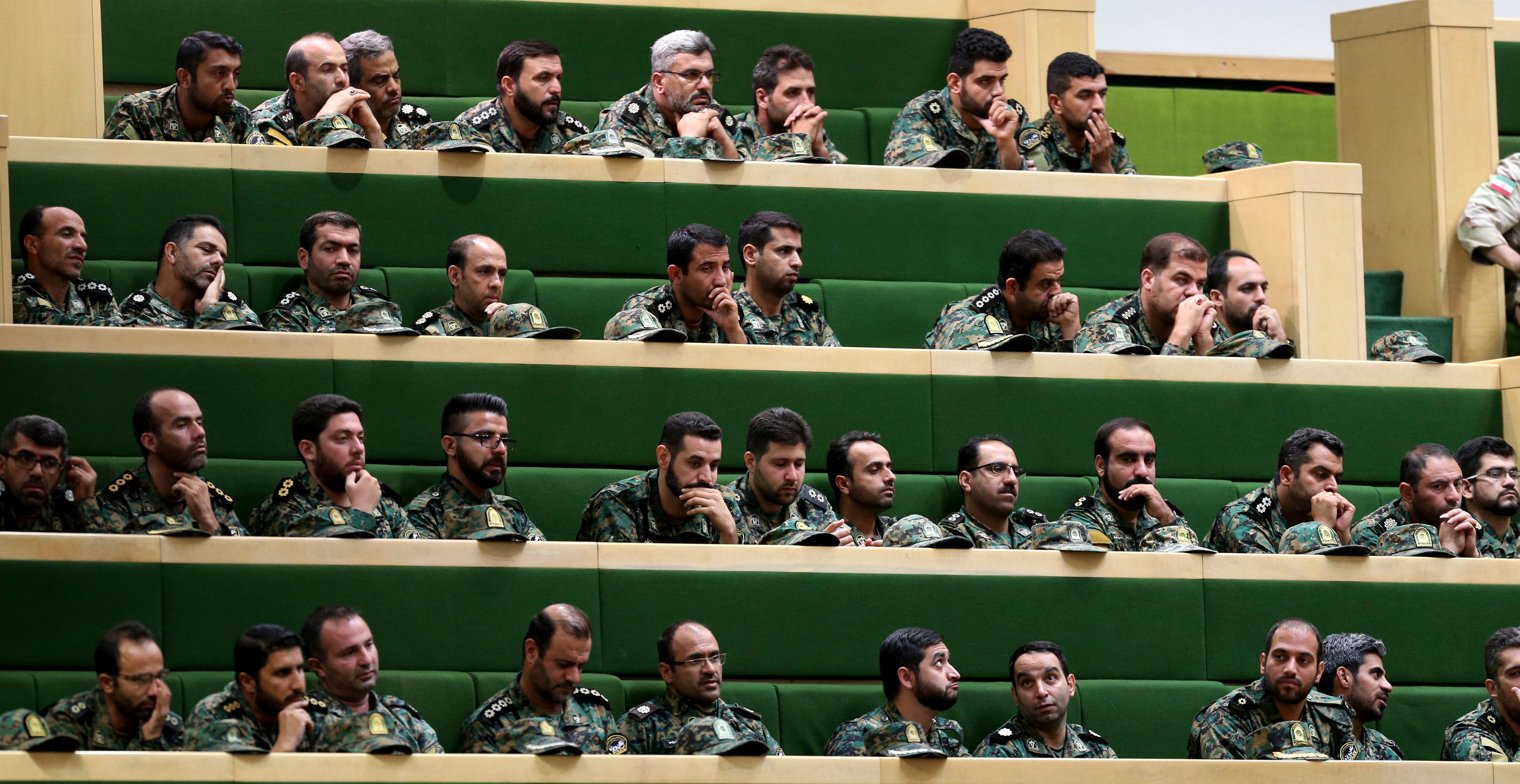 Members of the Iranian Revolutionary Guard listen to a speech in parliament in Tehran on October 7, 2018, over the a bill to counter terrorist financing. (ATTA KENARE/AFP/Getty Images)
