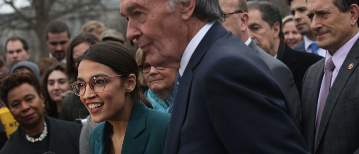 WASHINGTON, DC - FEBRUARY 07: U.S. Rep. Alexandria Ocasio-Cortez (D-NY) speaks as Sen. Ed Markey (D-MA) and other Congressional Democrats listen during a news conference in front of the U.S. Capitol February 7, 2019 in Washington, DC. Sen. Markey and Rep. Ocasio-Cortez held a news conference to unveil their Green New Deal resolution. (Photo by Alex Wong/Getty Images)