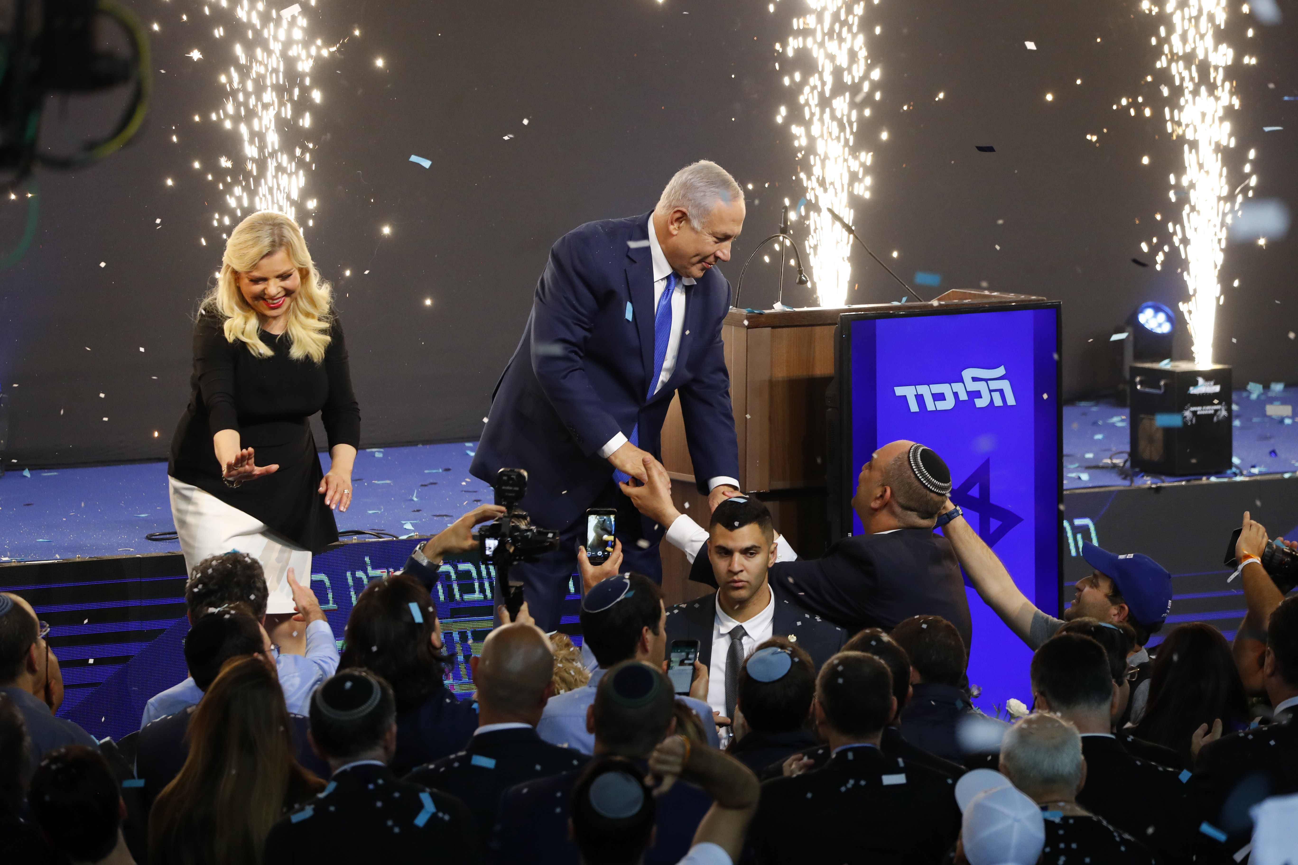 Israeli Prime Minister Benjamin Netanyahu (C) greets supporters at his Likud Party headquarters in the Israeli coastal city of Tel Aviv on election night early on April 10, 2019. (JACK GUEZ/AFP/Getty Images)