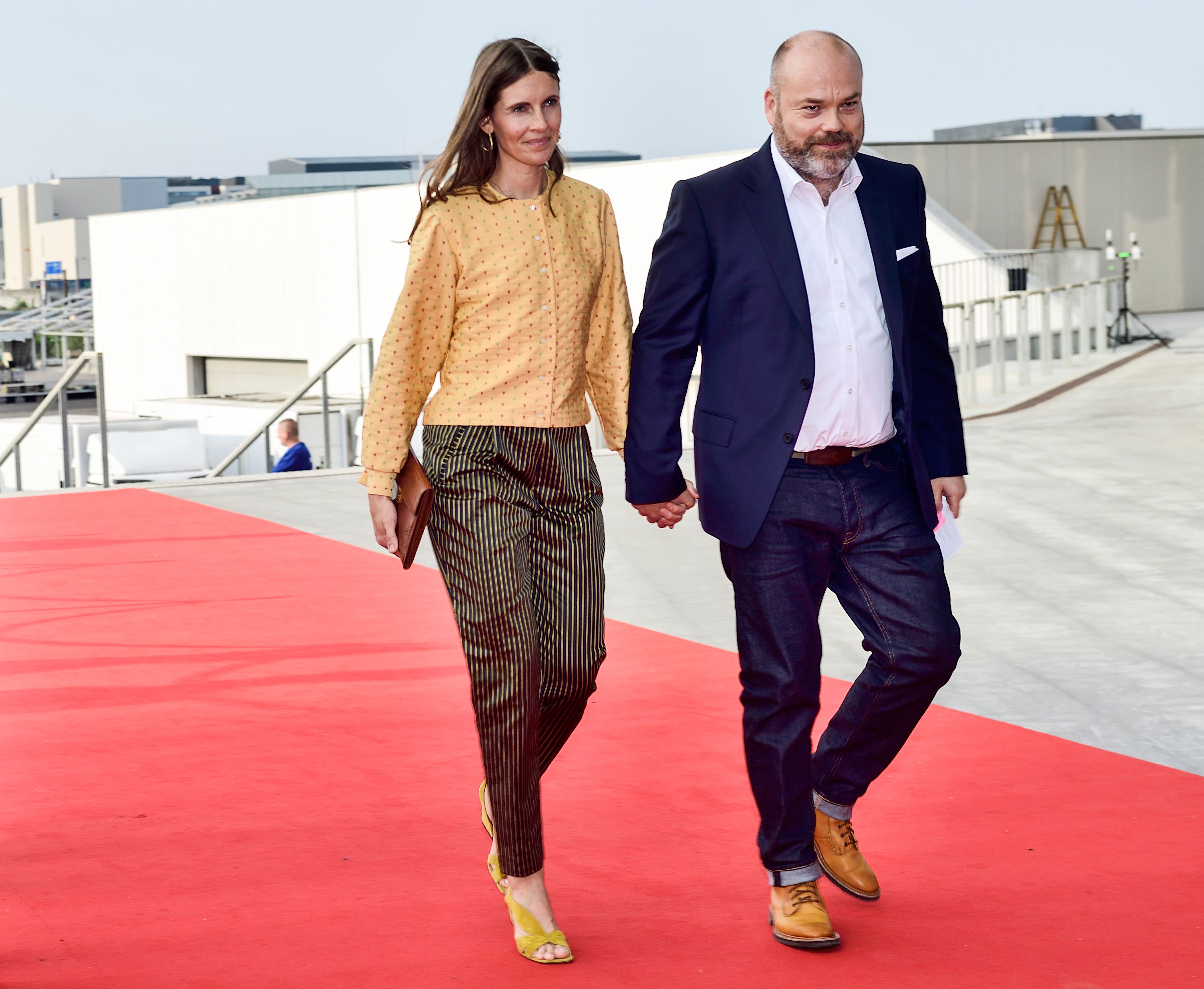 This picture taken on May 27, 2018 shows Bestseller-owner Anders Holch Povlsen and his wife Anne Holch Povlsen as they arrive at the celebration of the 50th birthday of Crown Prince Frederik of Denmark in Royal Arena in Copenhagen, Denmark. (TARIQ MIKKEL KHAN/AFP/Getty Images)