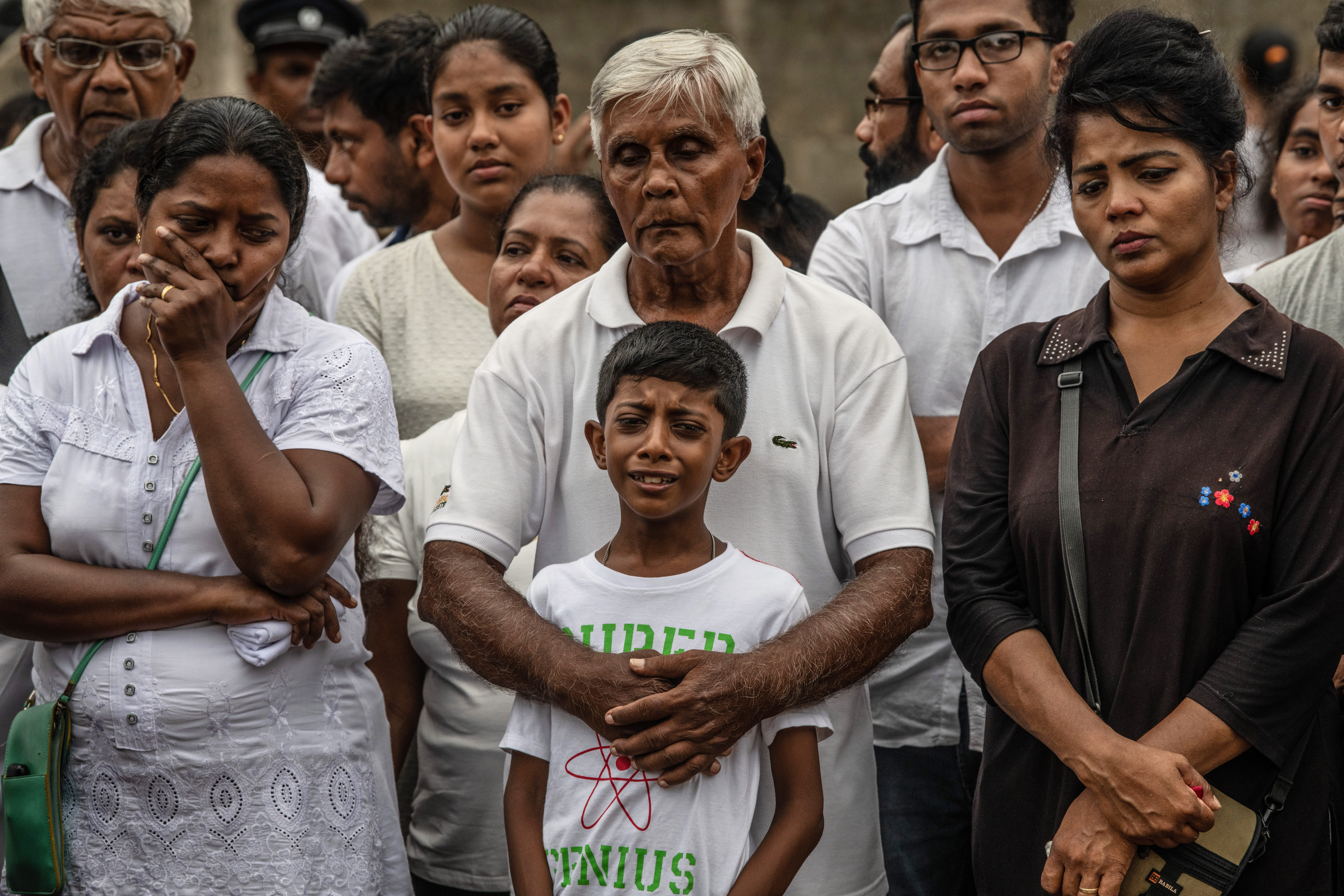 A young boy cries during a funeral for a family member killed in the Easter Sunday attack on St Sebastian's Church, on April 25, 2019 in Negombo, Sri Lanka. (Photo by Carl Court/Getty Images)