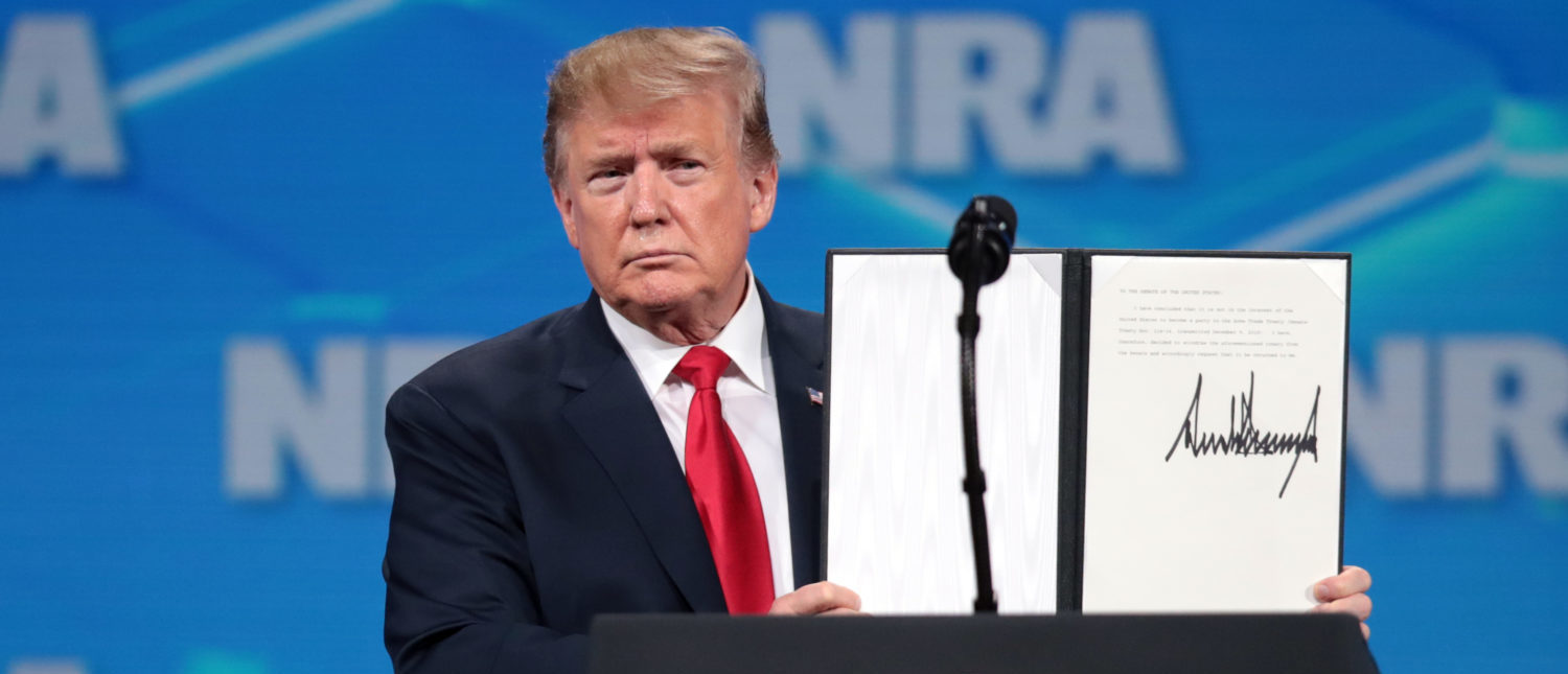 INDIANAPOLIS, INDIANA - APRIL 26: U.S. President Donald Trump shows the crowd a signed document rejecting the UN Arms Trade Treaty at the NRA-ILA Leadership Forum at the 148th NRA Annual Meetings & Exhibits on April 26, 2019 in Indianapolis, Indiana. The convention, which runs through Sunday, features more than 800 exhibitors and is expected to draw 80,000 guests. (Photo by Scott Olson/Getty Images)