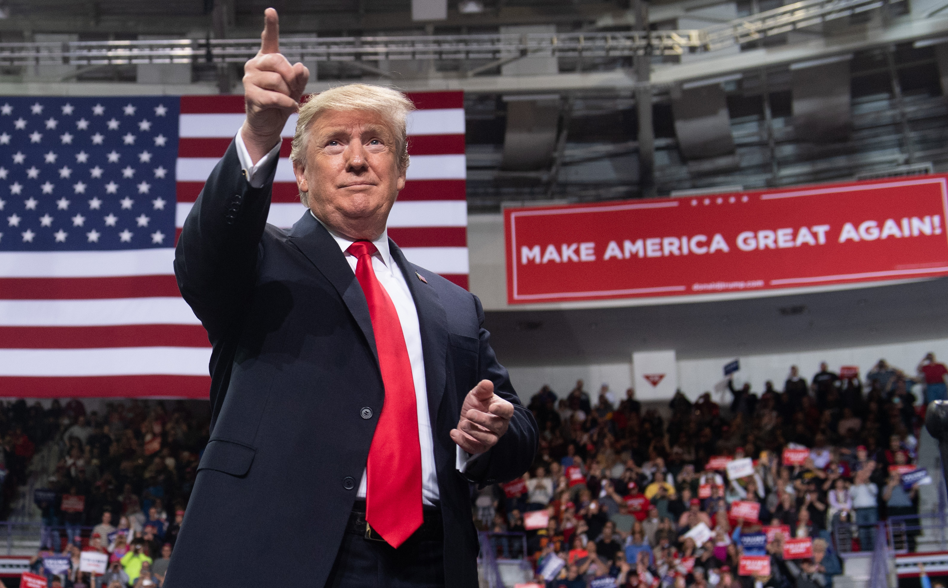 US President Donald Trump gestures during a Make America Great Again rally in Green Bay, Wisconsin, April 27, 2019. (Photo by SAUL LOEB/AFP/Getty Images)