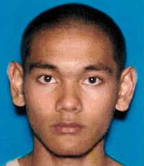 In this undated handout photo provided by the FBI, Mark Steven Domingo poses for a DMV photo. (Photo by FBI via Getty Images)