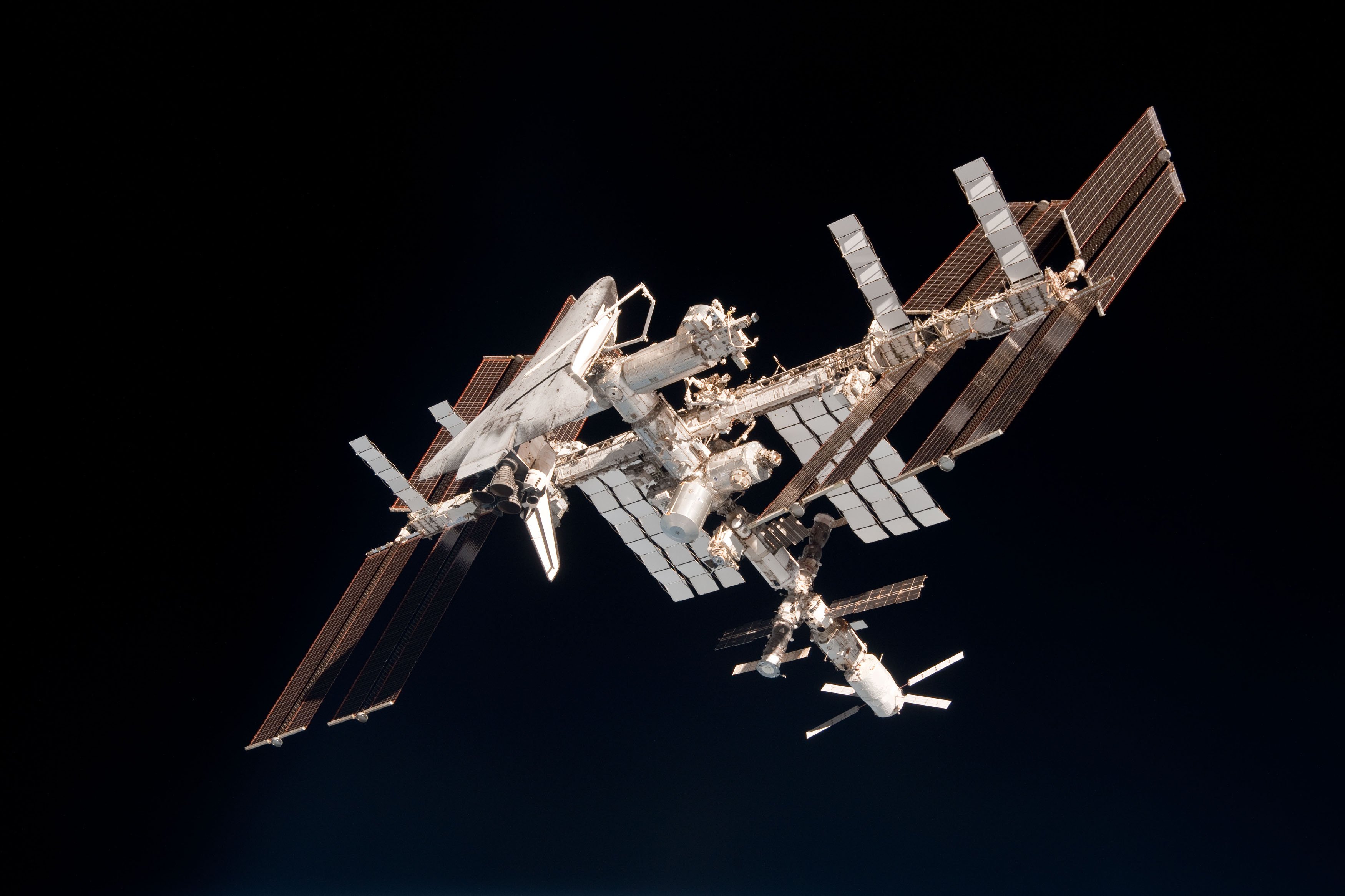IN SPACE - MAY 23: In this handout image provided by the European Space Agency (ESA) and NASA, the International Space Station and the docked space shuttle Endeavour orbit Earth during Endeavour's final sortie on May 23, 2011 in Space. (Paolo Nespoli - ESA/NASA via Getty Images)