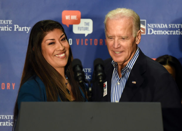 LAS VEGAS, NV - NOVEMBER 01: Democratic candidate for lieutenant governor and current Nevada Assemblywoman Lucy Flores (D-Las Vegas) (L) introduces U.S. Vice President Joe Biden at a get-out-the-vote rally at a union hall on November 1, 2014 in Las Vegas, Nevada. Biden is stumping for Nevada Democrats ahead of the November 4th election. (Photo by Ethan Miller/Getty Images)