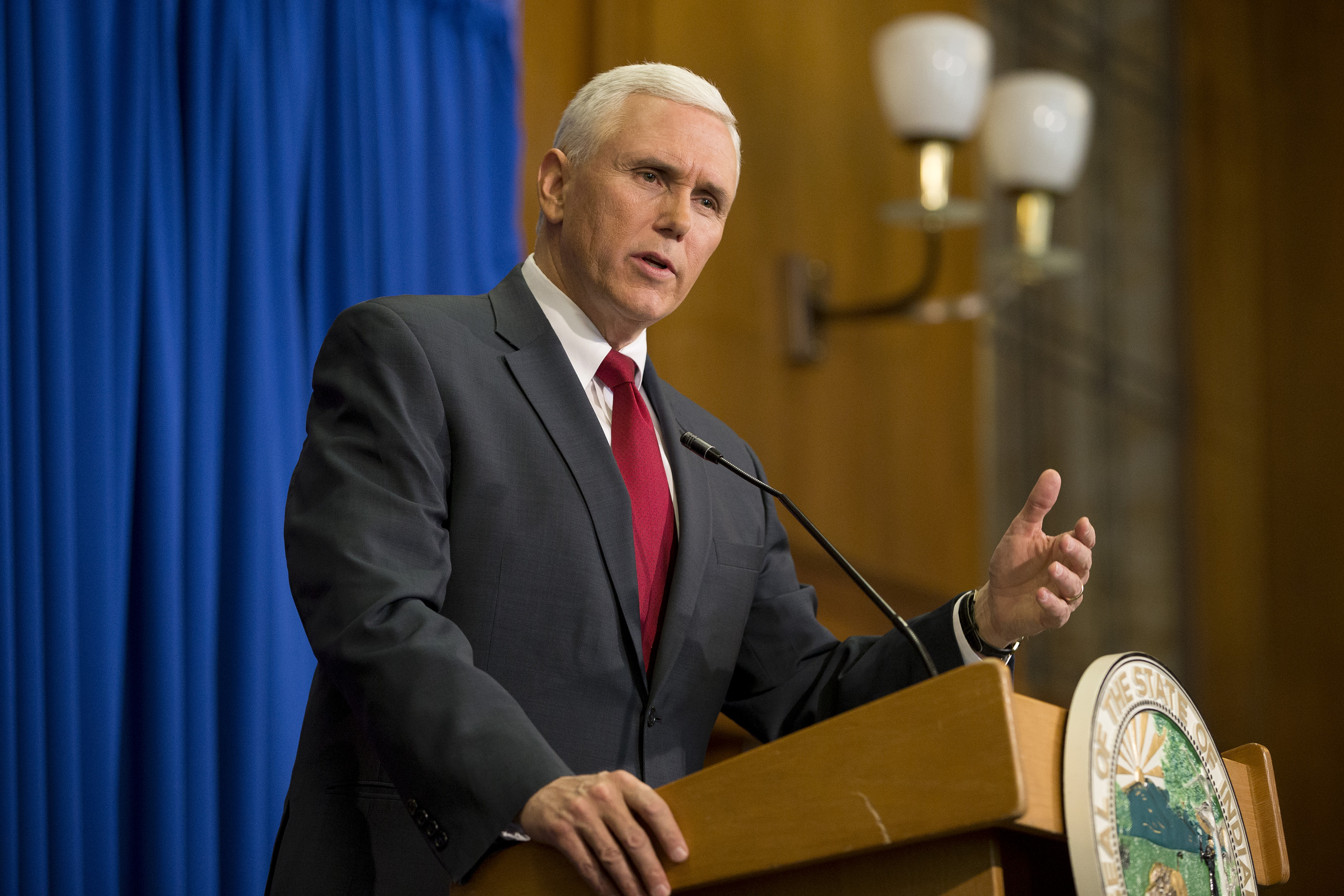 INDIANAPOLIS, IN - MARCH 31: Indiana Gov. Mike Pence speaks during a press conference March 31, 2015 at the Indiana State Library in Indianapolis, Indiana. Pence spoke about the state's controversial Religious Freedom Restoration Act which has been condemned by business leaders and Democrats. (Photo by Aaron P. Bernstein/Getty Images)