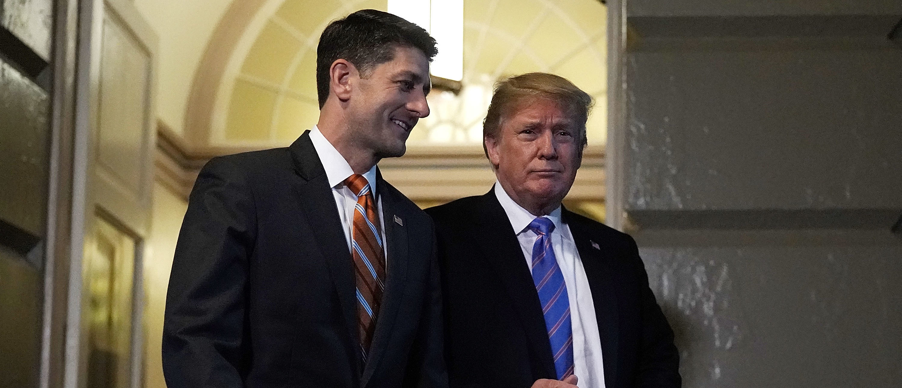 WASHINGTON, DC - JUNE 19: Accompanied by Speaker of the House Rep. Paul Ryan (R-WI) (L), U.S. President Donald Trump (R) arrives at a meeting with House Republicans at the U.S. Capitol June 19, 2018 in Washington, DC. Trump was on the Hill to discuss immigration with House Republicans. (Photo by Alex Wong/Getty Images)