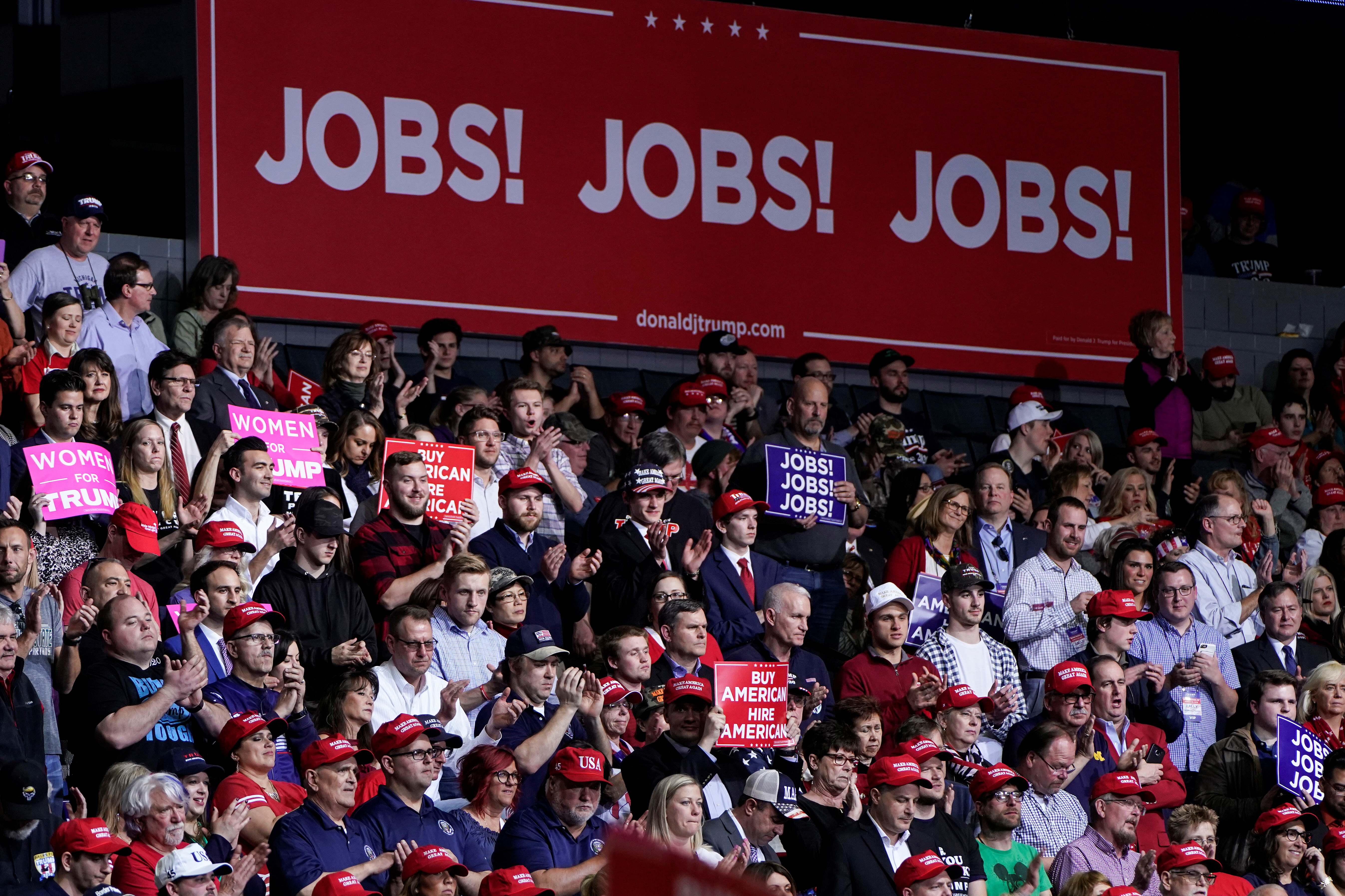 Supporters cheer U.S. President Donald Trump as he speaks during a campaign rally in Grand Rapids, Michigan, U.S., March 28, 2019. REUTERS/Joshua Roberts