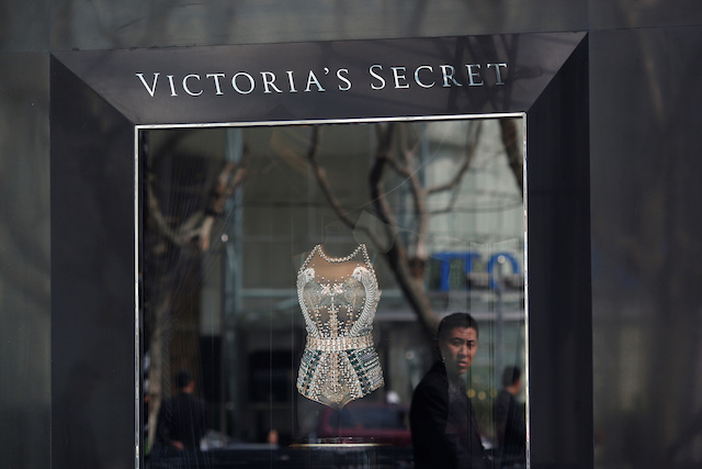 A security guard keeps watch during the opening ceremony of the Victoria's Secret Shanghai Flagship Store in Shanghai, China March 8, 2017. REUTERS/Aly Song 