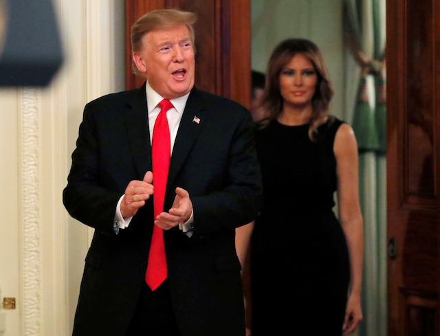 U.S. President Donald Trump and First Lady Melania Trump arrive at the National African American History Month Reception at the White House in Washington, U.S., February 21, 2019. REUTERS/Jim Young 