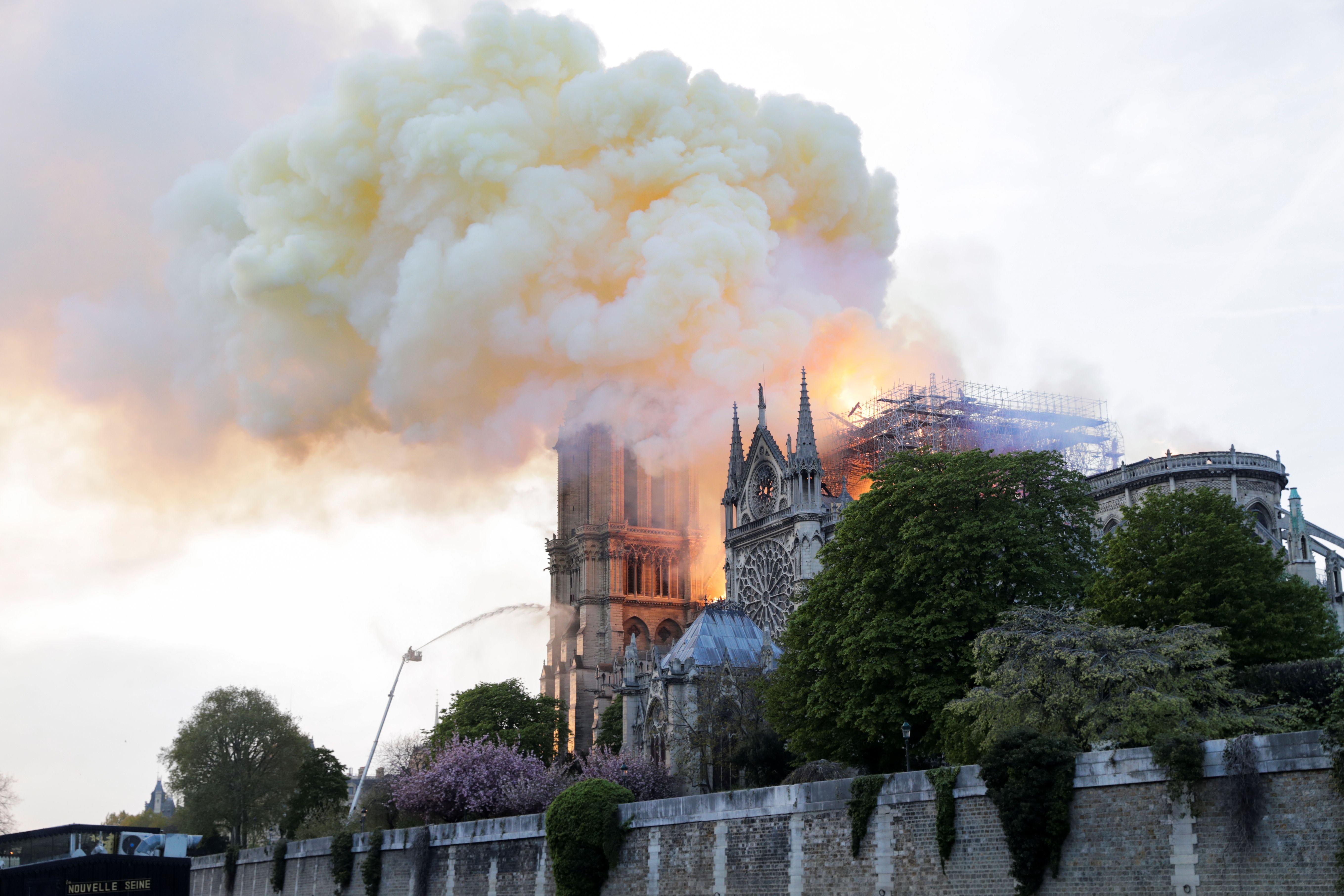Flames and smoke billow from the roof at Notre-Dame Cathedral in Paris on April 15, 2019.(THOMAS SAMSON/AFP/Getty Images)