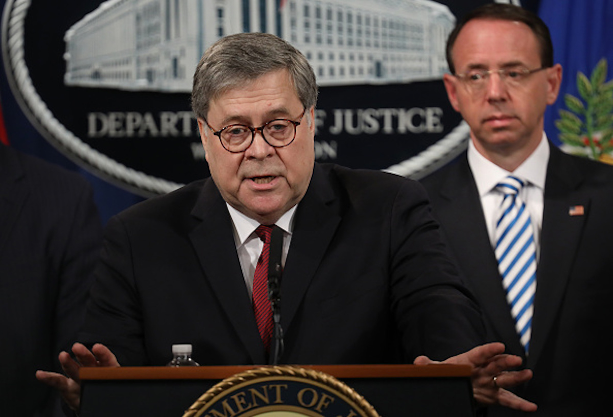 WASHINGTON, DC - APRIL 18: U.S. Attorney General William Barr speaks during a press conference on the release of the redacted version of the Mueller report at the Department of Justice April 18, 2019 in Washington, DC. Members of Congress are expected to receive copies of the report later this morning with the report being released publicly soon after. Also pictured is Deputy Attorney General Rod Rosenstein. (Photo by Win McNamee/Getty Images)
