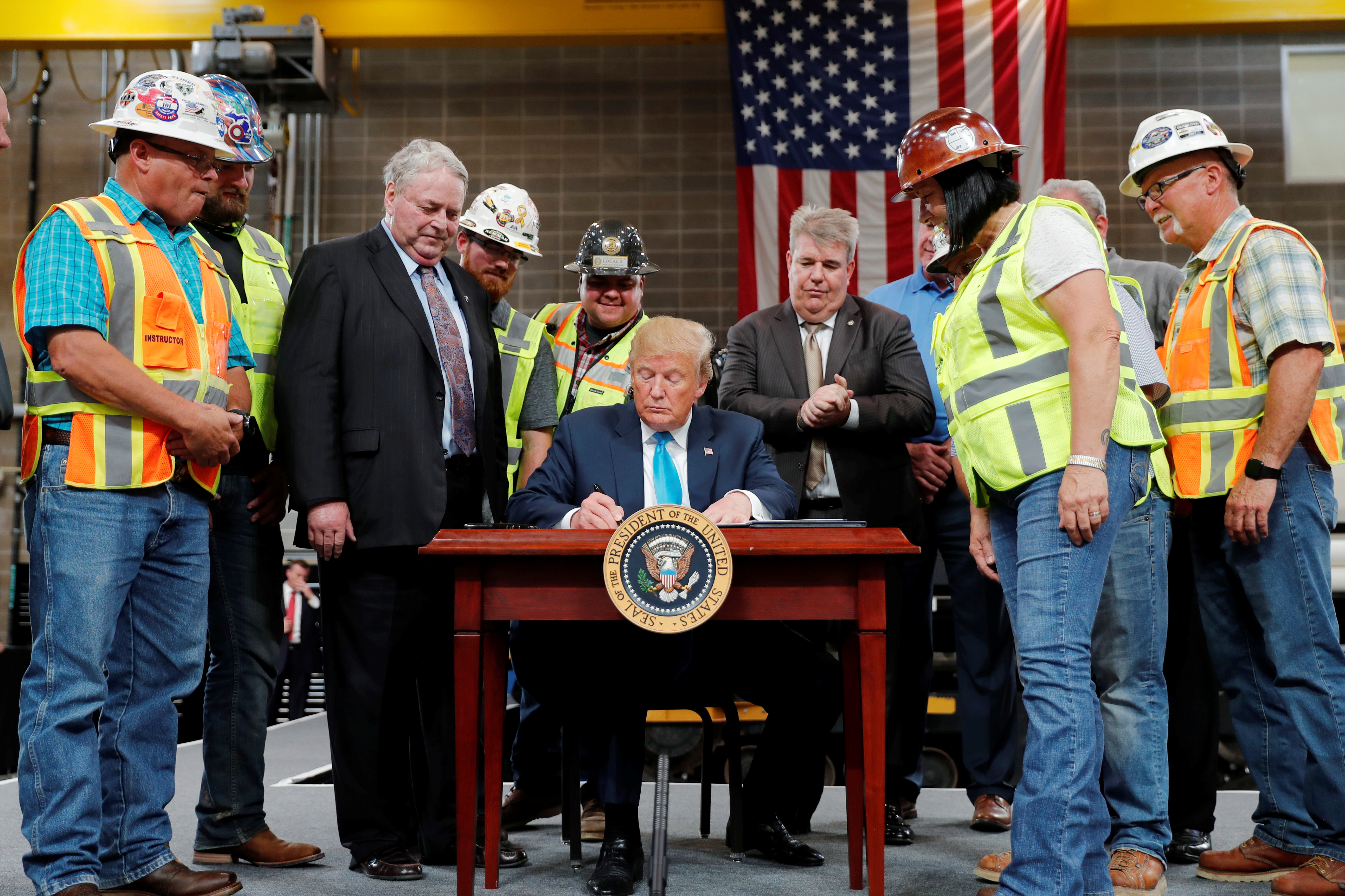U.S. President Trump participates in energy and infrastructure executive order signing event in Crosby, Texas