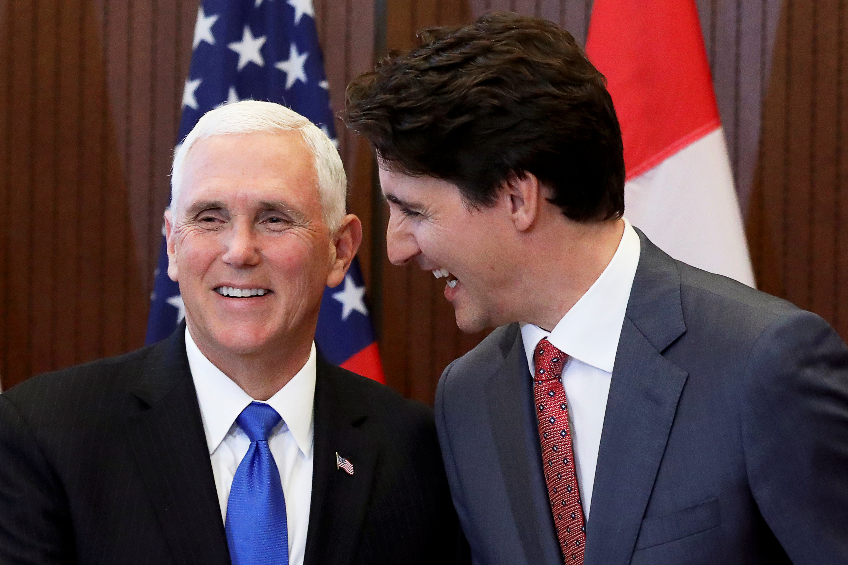Canada's Prime Minister Justin Trudeau and U.S. Vice President Mike Pence shake hands during a welcoming ceremony on Parliament Hill in Ottawa, Ontario, Canada, May 30, 2019. REUTERS/Chris Wattie 