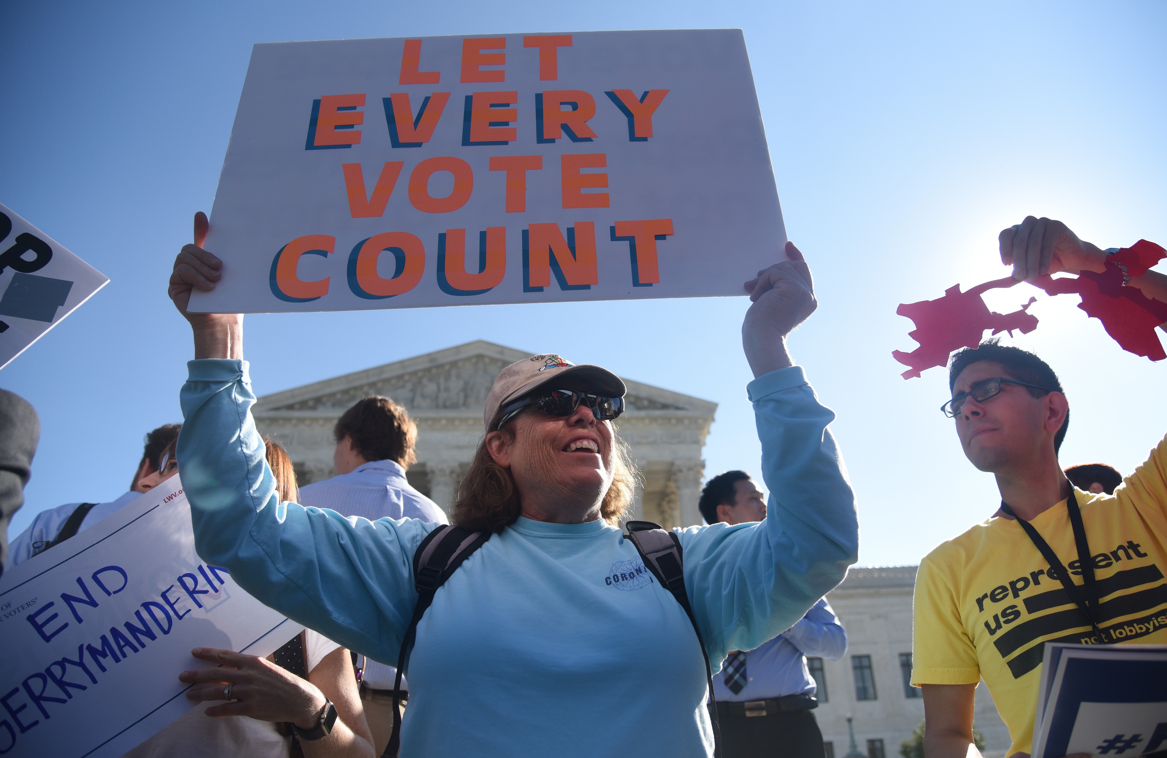 Demonstrators gather outside of the Supreme Court to call for an end to partisan gerrymandering on October 3, 2017. (Olivier Douliery/Getty Images)