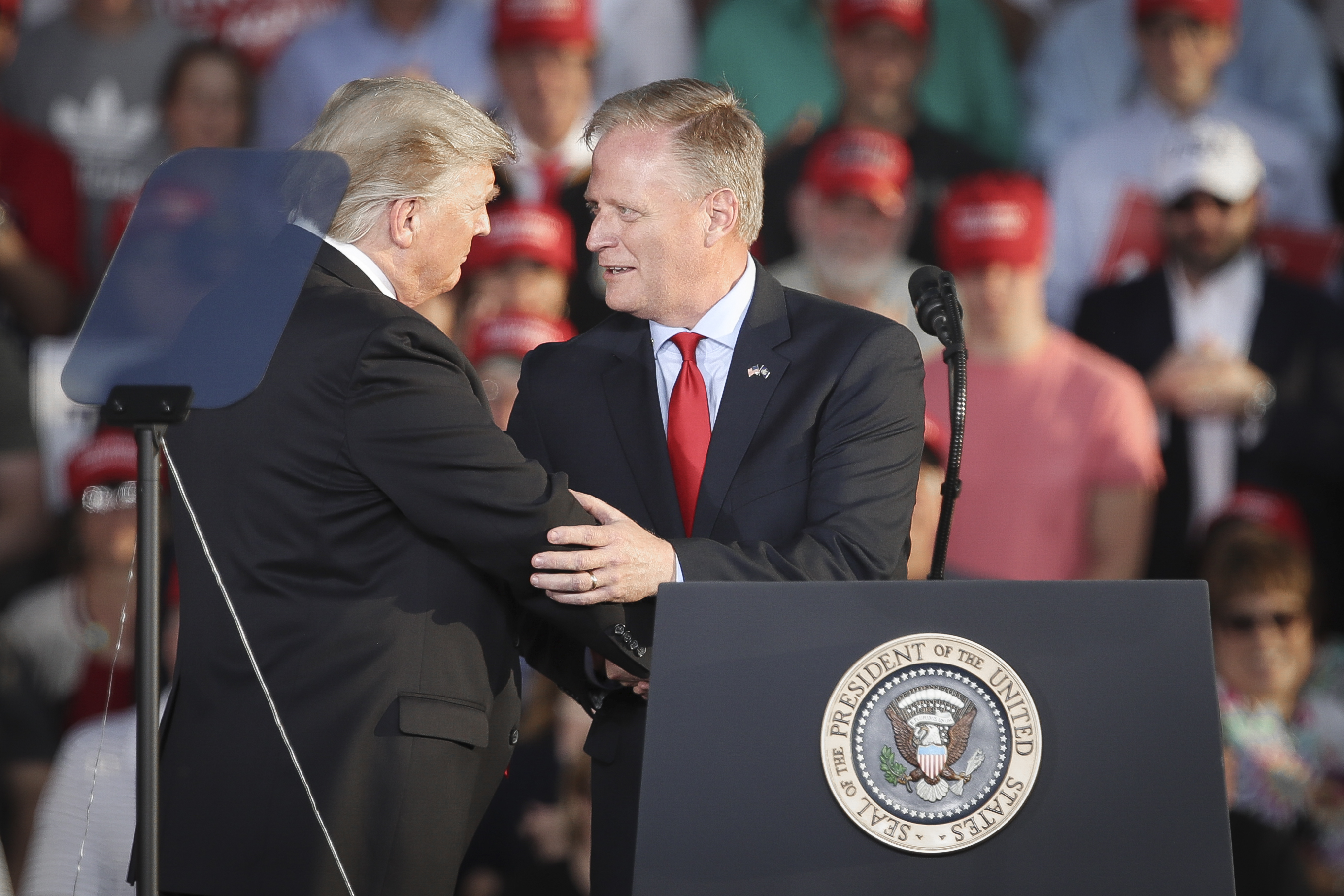 U.S. President Donald Trump shakes hands with Fred Keller, Republican candidate for Congress in Pennsylvania's 12th Congressional district, during a 'Make America Great Again' campaign rally at Williamsport Regional Airport, May 20, 2019 in Montoursville, Pennsylvania. (Photo by Drew Angerer/Getty Images)