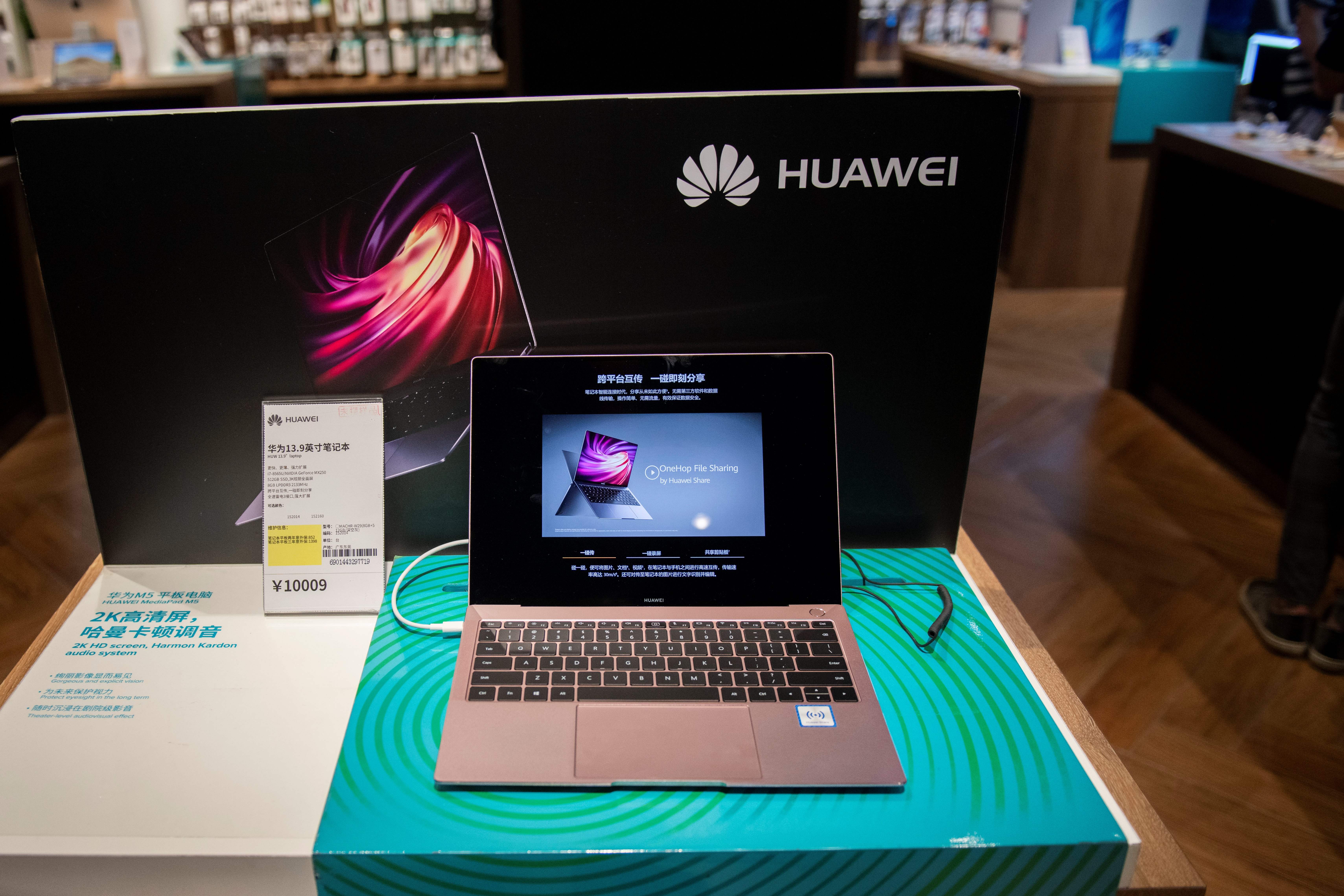 A Huawei computer is displayed in a retail store in Beijing on May 21, 2019. (NICOLAS ASFOURI/AFP/Getty Images)