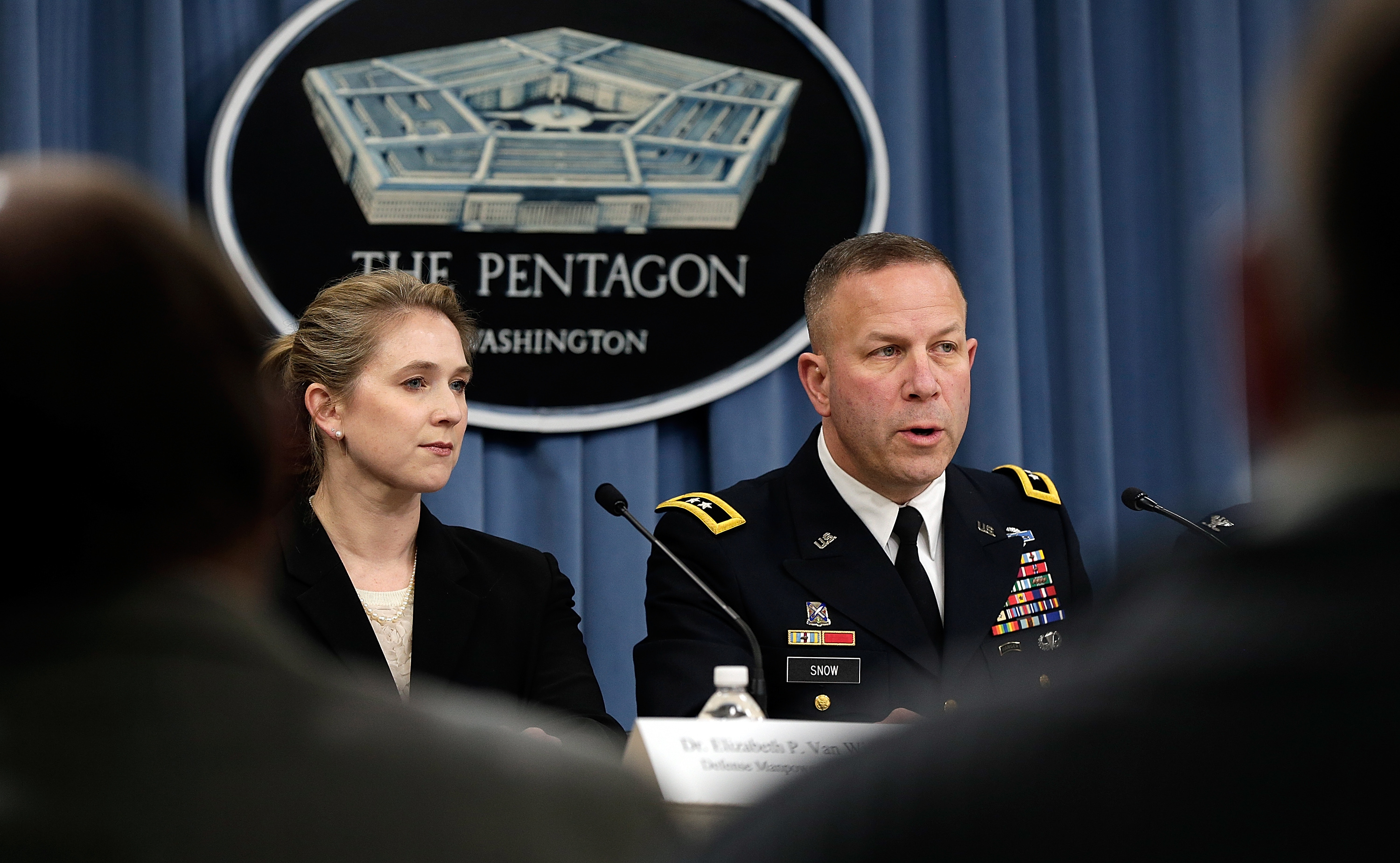 ARLINGTON, VA - JANUARY 10: Army Maj. Gen. Jeffrey Snow (R), director of the Pentagon's Sexual Assault Prevention and Response Office, joins other senior leaders in a press conference at the Pentagon on sexual assaults in the military January 10, 2014 in Arlington, Virginia. From left to right are Dr. Elizabeth Van Winkle and U.S. Army Maj. Gen. Jeffrey Snow. (Win McNamee/Getty Images)
