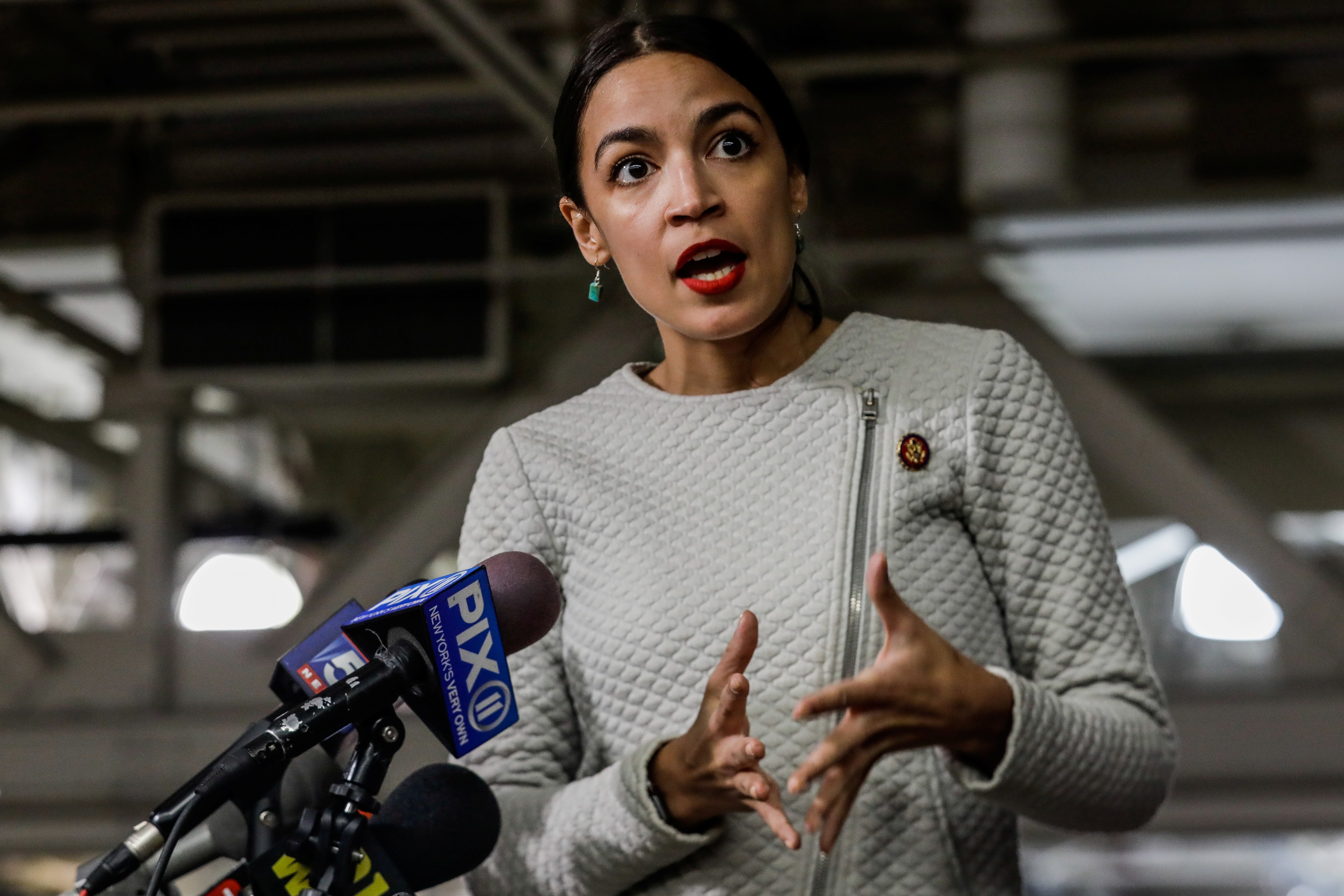 U.S. Representative Alexandria Ocasio-Cortez (D-NY) speaks during the press conference before the town hall meeting in the Queens borough of New York City