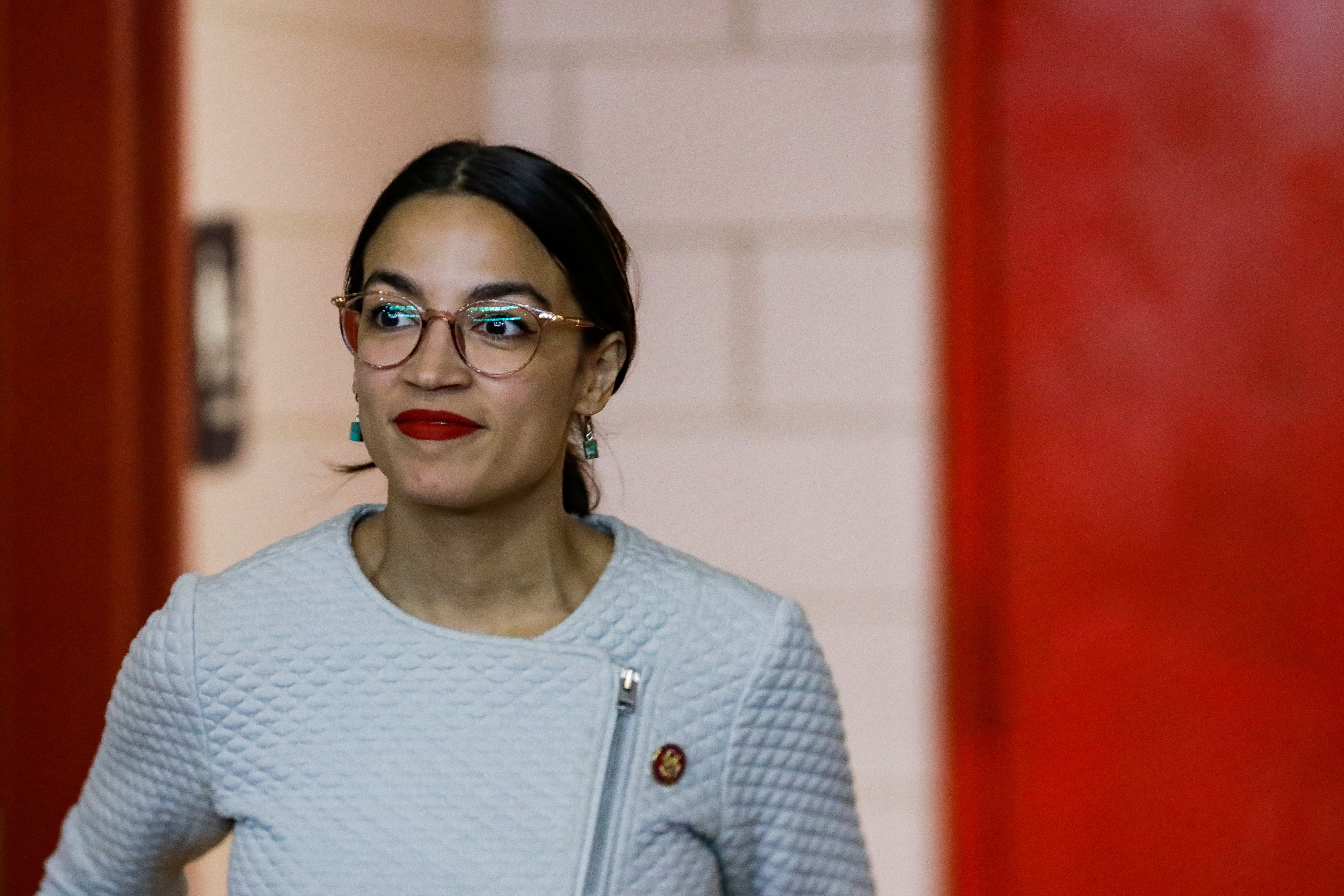 U.S. Representative Alexandria Ocasio-Cortez (D-NY) arrives before the town hall meeting in the Queens borough of New York City