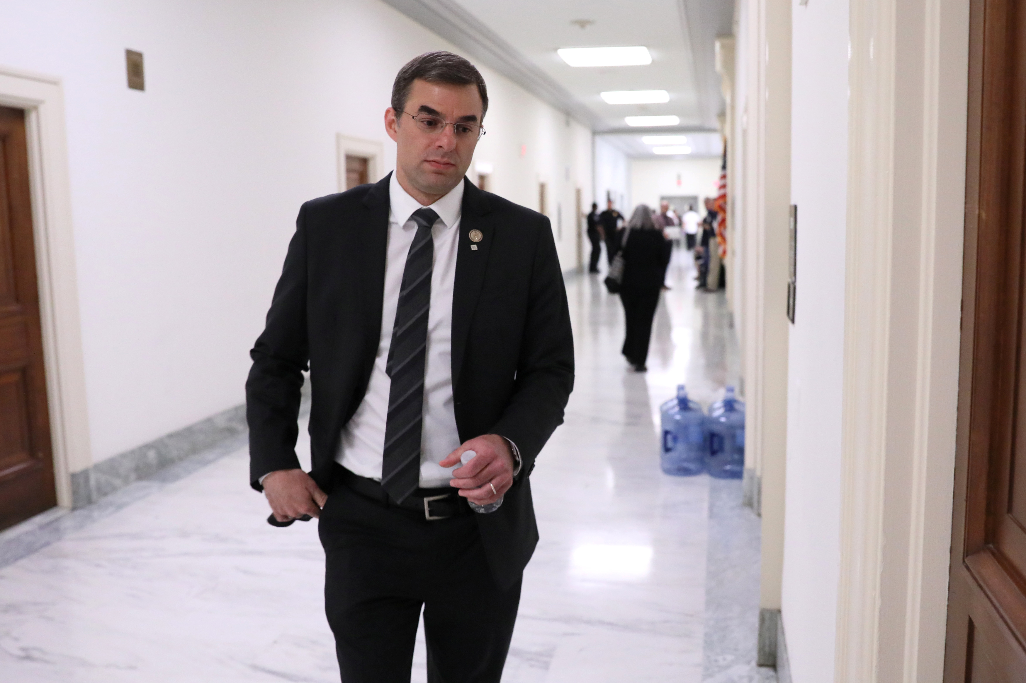 U.S. Representative Justin Amash, who recently tweeted his view that the Mueller report on Russia showed that President Trump had obstructed justice, arrives for a House Oversight Committee Hearing on Capitol Hill in Washington, U.S. May 22, 2019. REUTERS/Jonathan Ernst