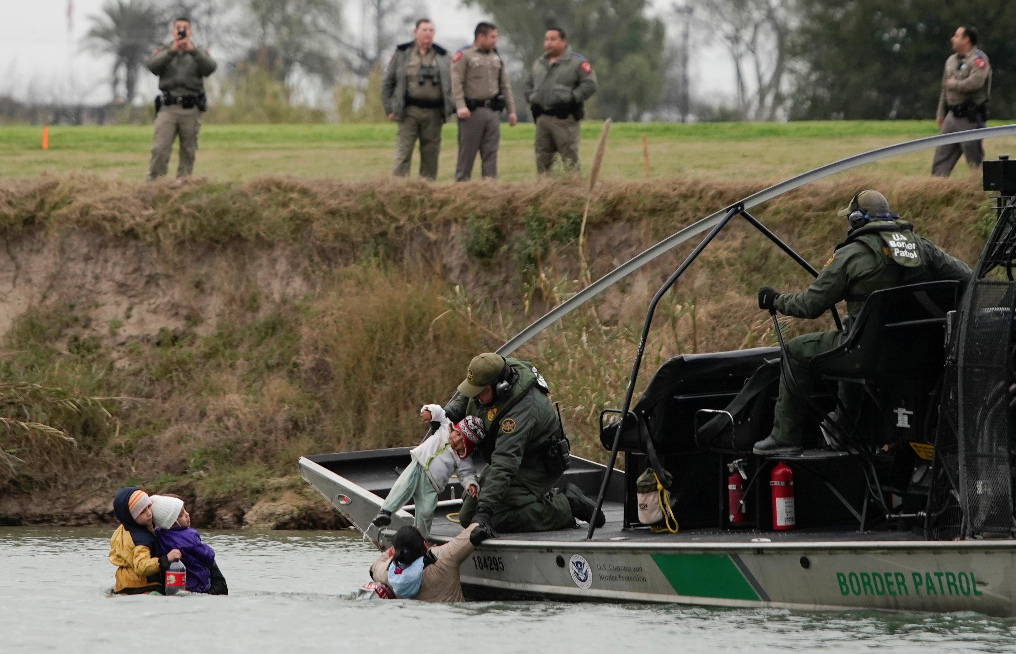 U.S. border patrol boat rescues migrants crossing the Rio Bravo towards the United States, seen from Piedras Negras